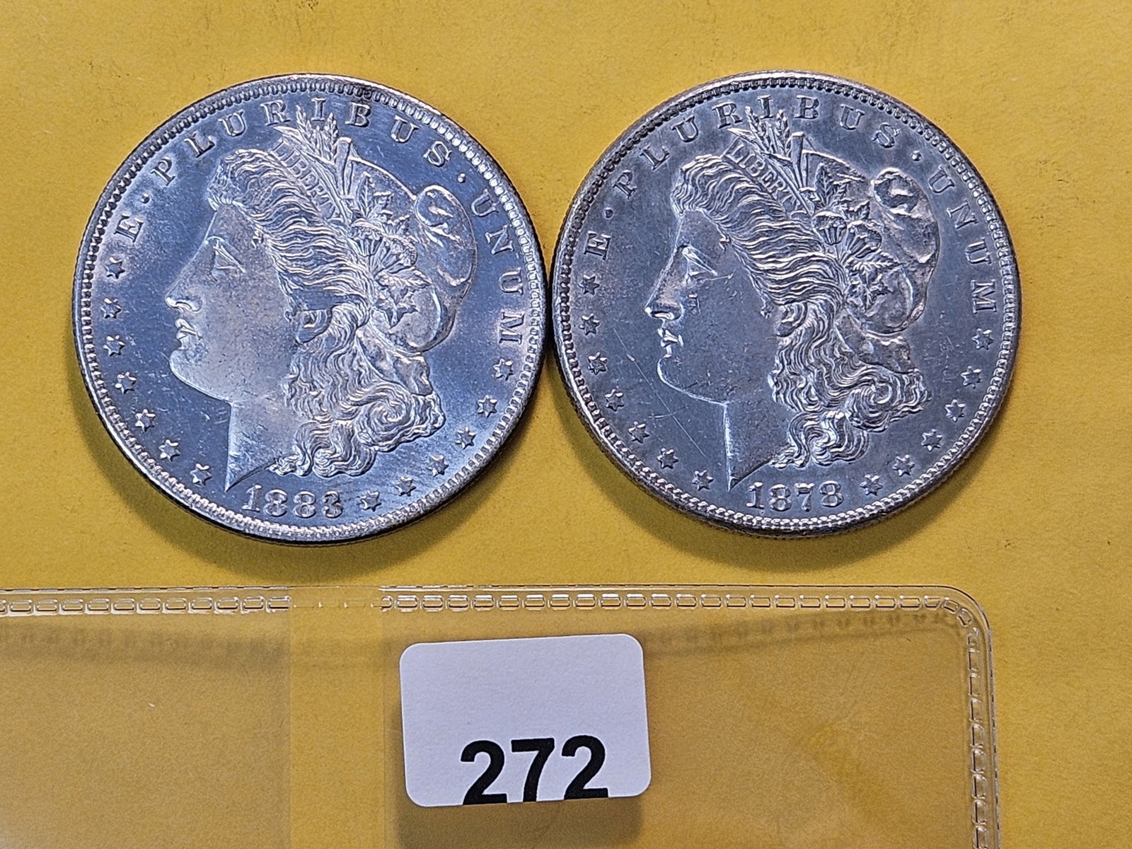 Two About Uncirculated Plus Morgan Silver Dollars: 1878-S and 1883-O