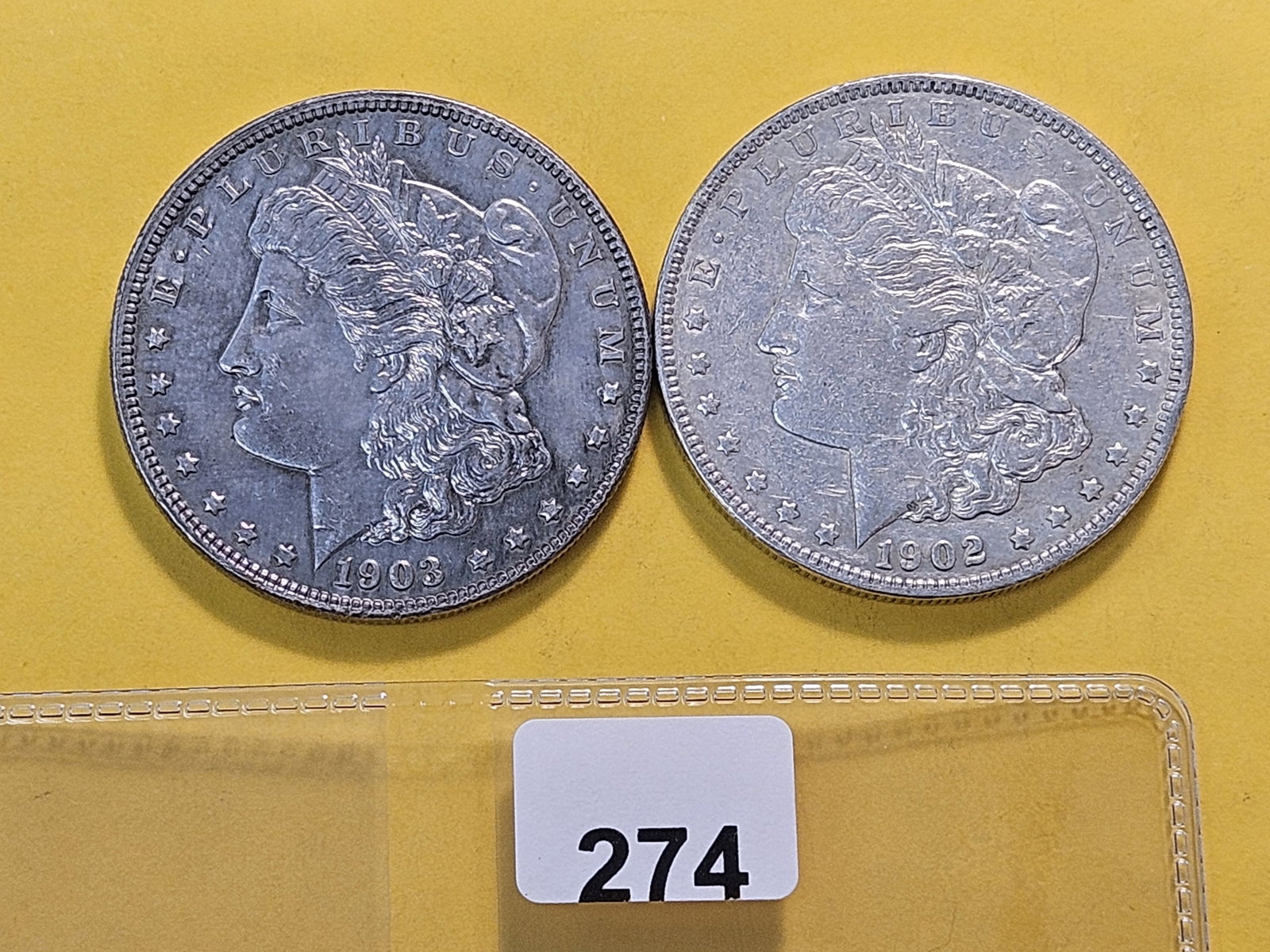 Two About Uncirculated Morgan Silver Dollars: 1902 and 1903