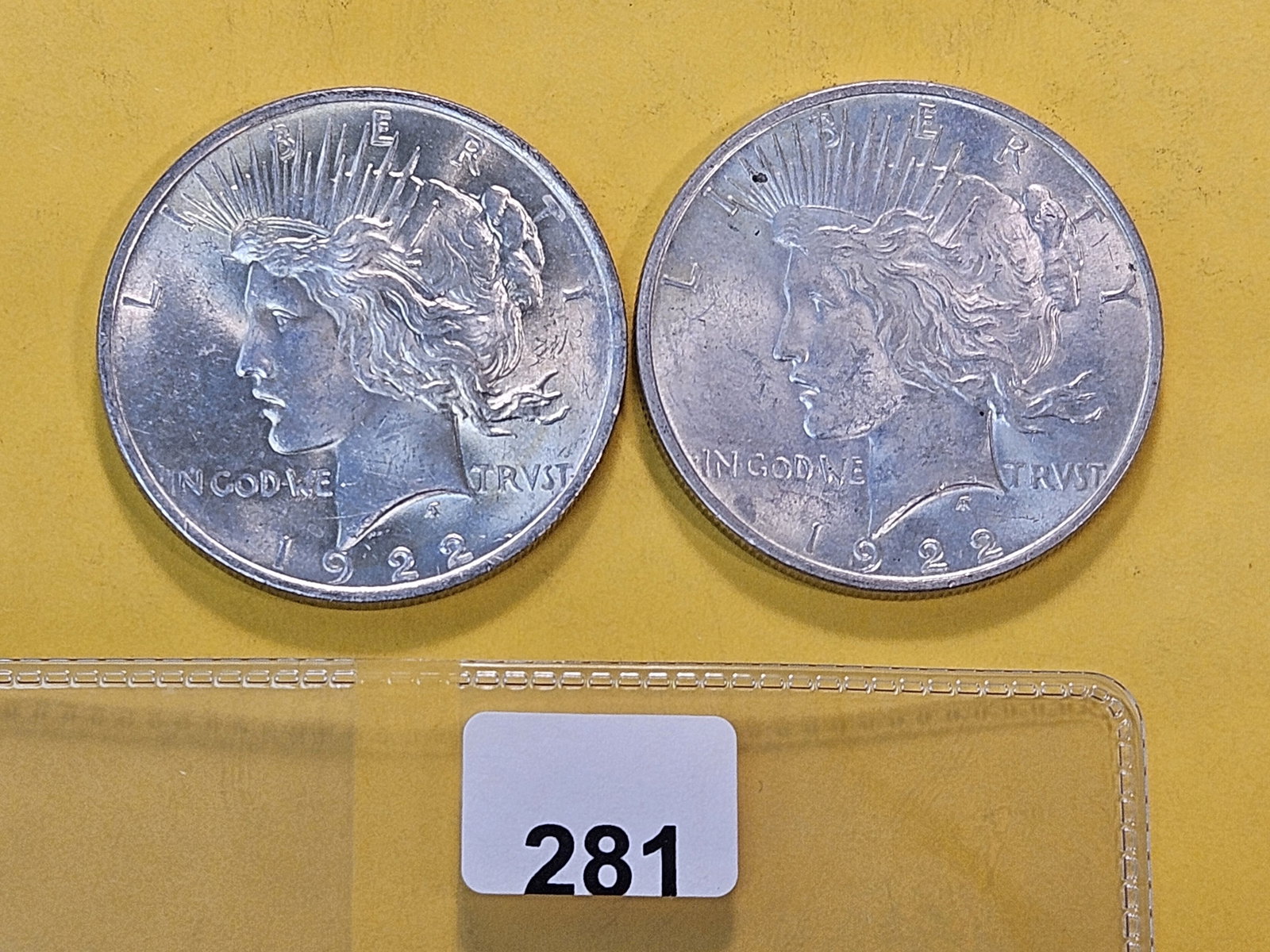 Two About Uncirculated plus 1922 Peace Silver Dollars (1 of 4)