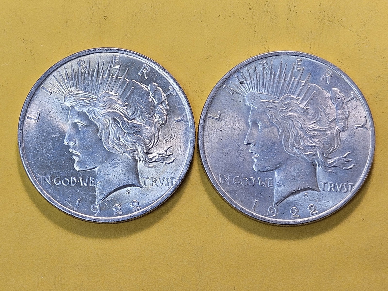 Two About Uncirculated plus 1922 Peace Silver Dollars - 2