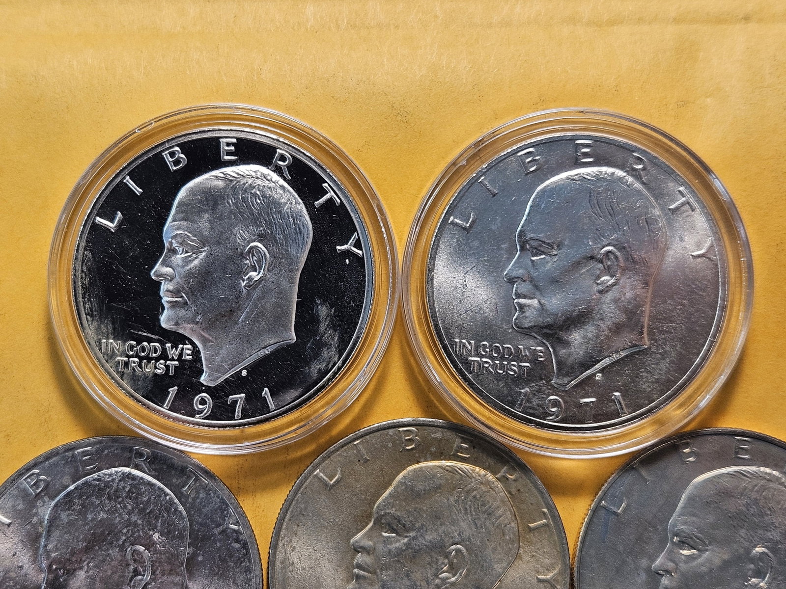 Twenty-two Eisenhower Dollars, two are Silver - 2