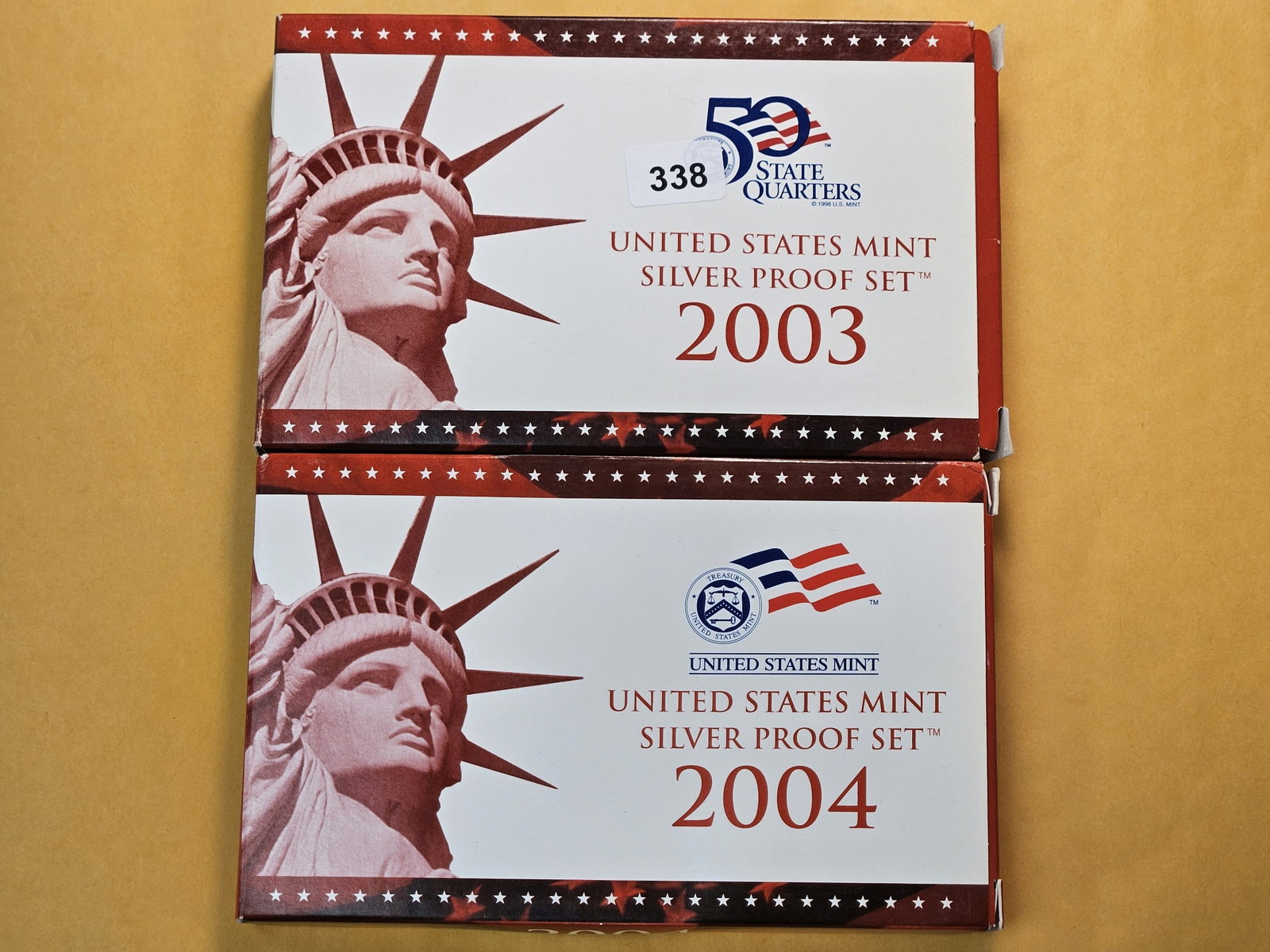 Two United States Mint Silver Proof Sets: 2003 and 2004. In Original Government Packaging with Certificates of Authenticity