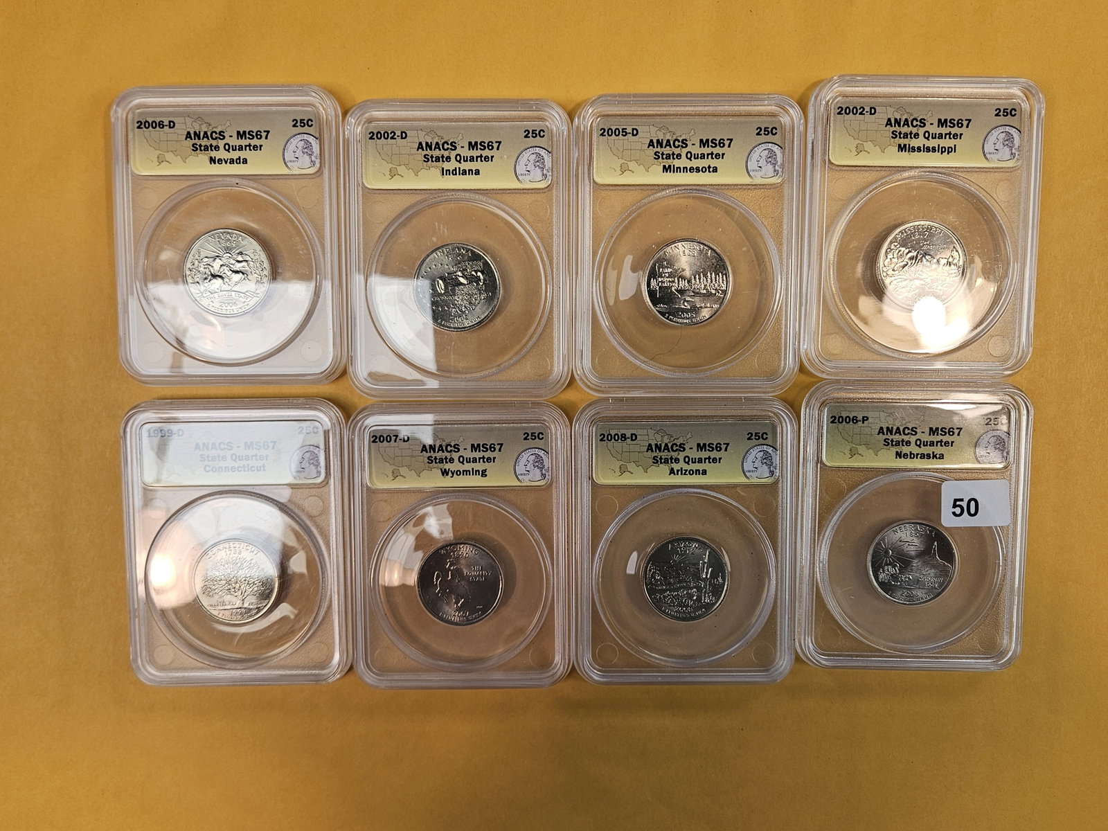 Eight, Superb GEM, ANACS-graded Washington Quarters: All in Mint State 67. All clad