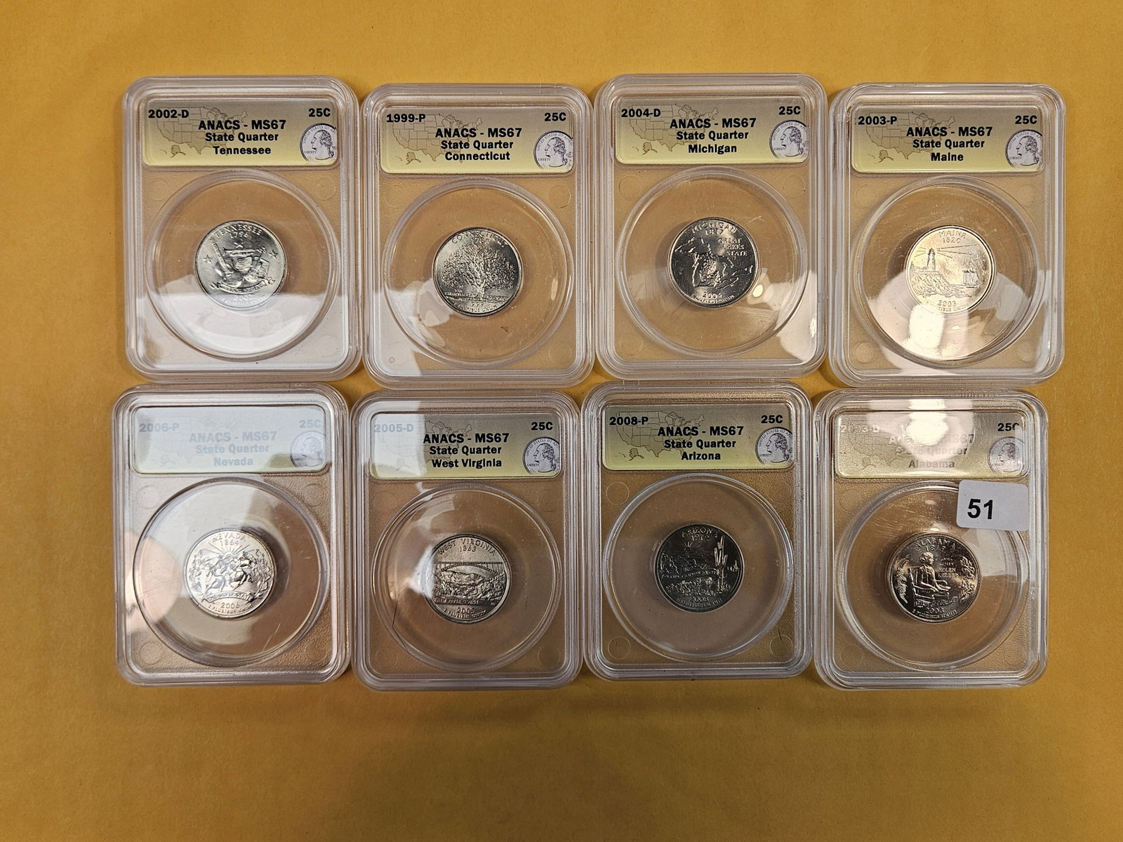 Eight, Superb GEM, ANACS-graded Washington Quarters: All in Mint State 67. All clad