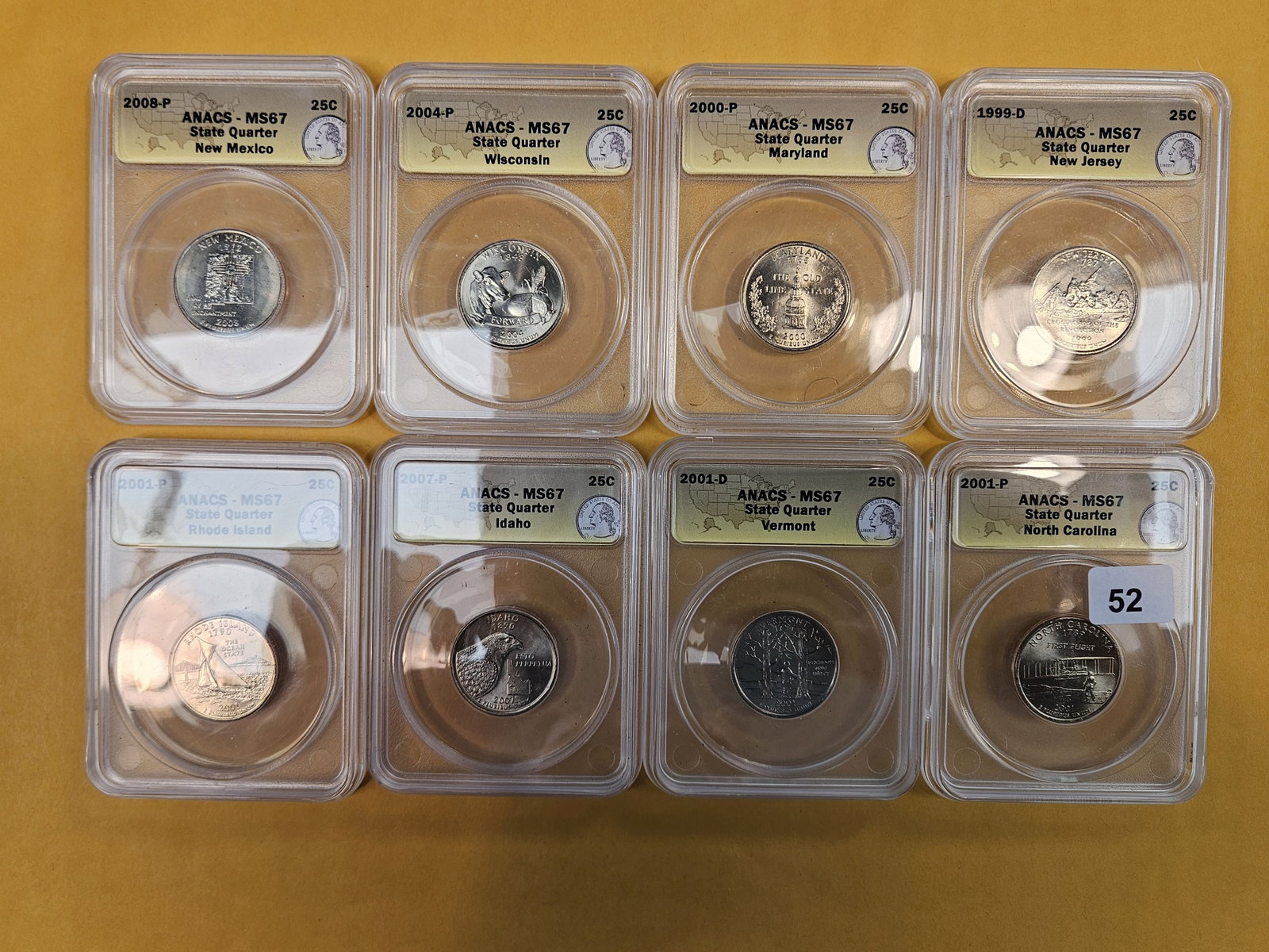 Eight, Superb GEM, ANACS-graded Washington Quarters: All in Mint State 67. All clad