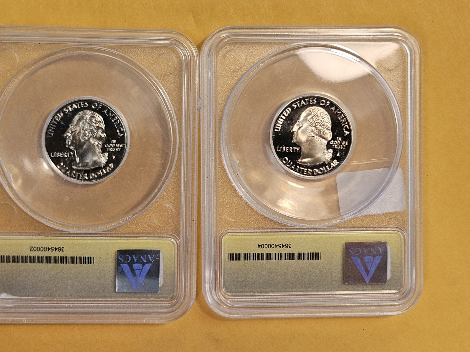 PERFECT! Two ANACS-graded Proof 70 Deep Cameo Washington Quarters - 2