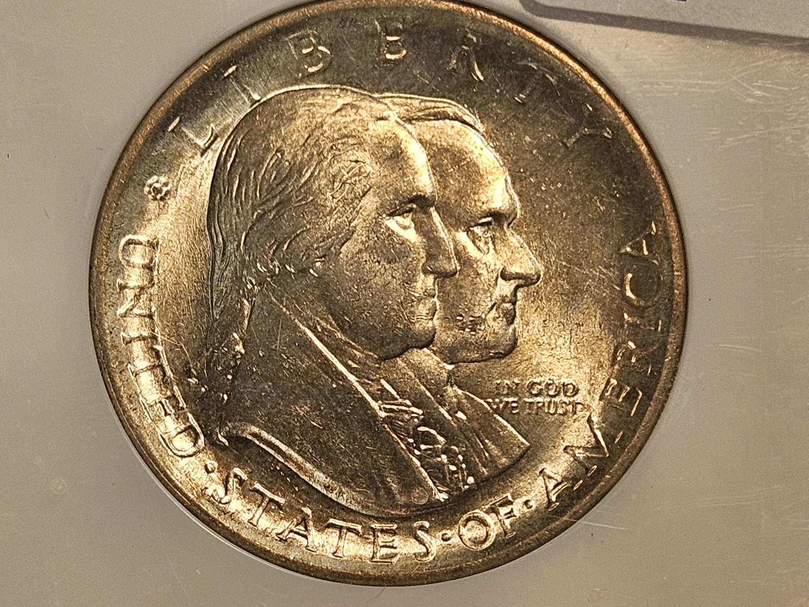 NGC 1926 Sesquicentennial Commemorative silver half dollar in Mint State 63: Beautiful luster. Lightly toned