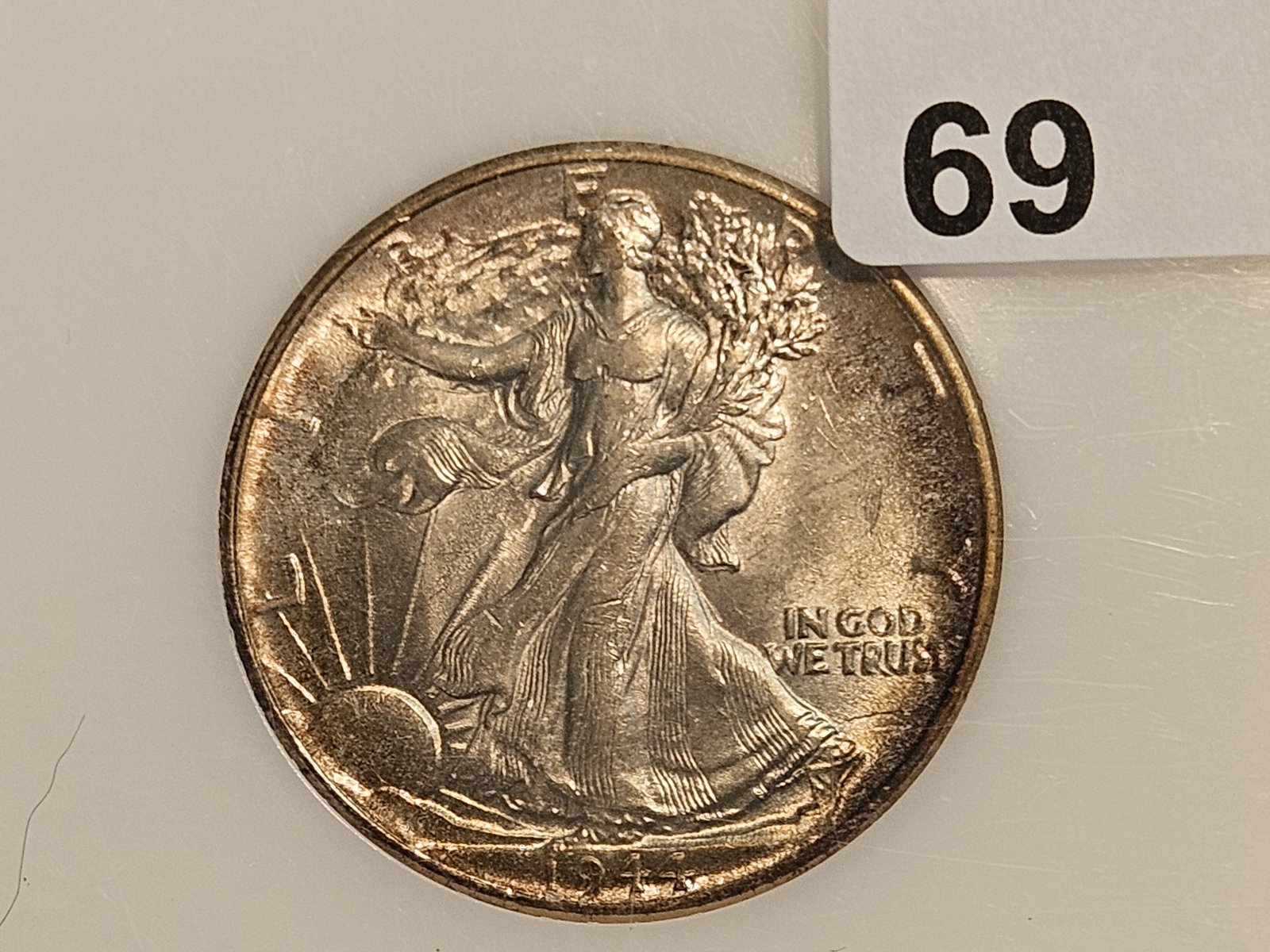PCI 1944 Walking Liberty silver Half Dollar in Brilliant About Uncirculated 55: Phenomenal toning on the reverse