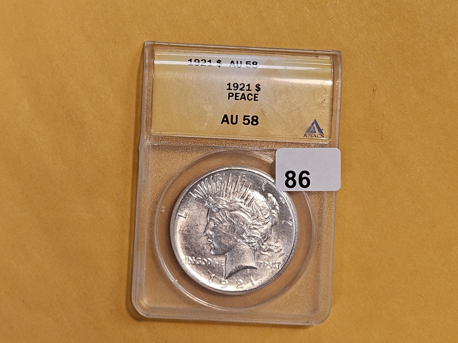 ** KEY DATE ** ANACS 1921 Peace Silver Dollar in Brilliant About Uncirculated - 58 - 2
