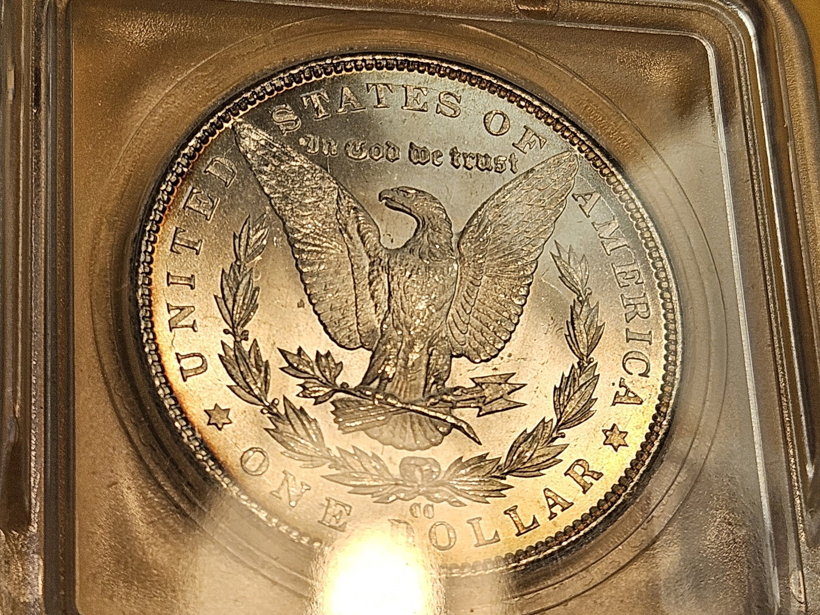 ** KEY DATE ** ICG 1885-CC Morgan Dollar in Mint State 64 - 10