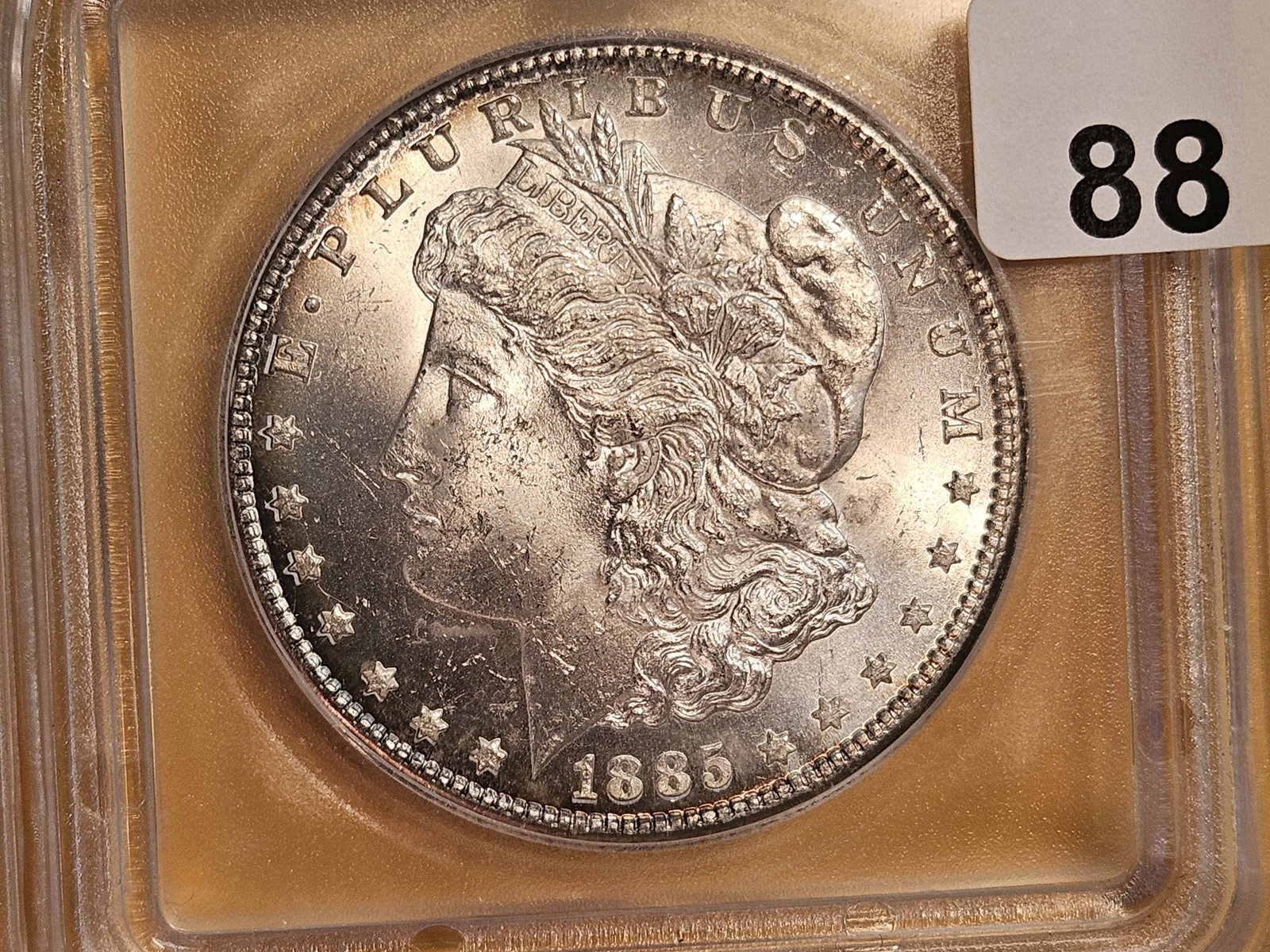 ** KEY DATE ** ICG 1885-CC Morgan Dollar in Mint State 64 (1 of 15)