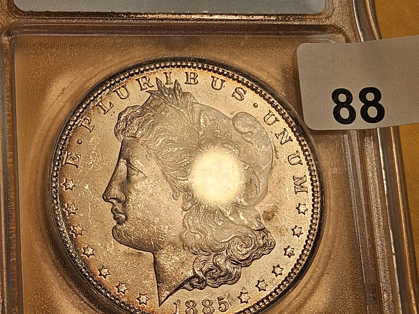 ** KEY DATE ** ICG 1885-CC Morgan Dollar in Mint State 64 - 5