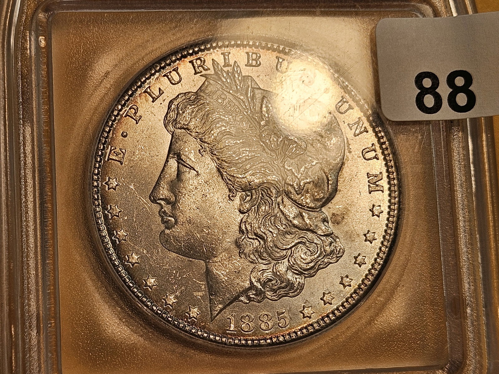 ** KEY DATE ** ICG 1885-CC Morgan Dollar in Mint State 64 - 6