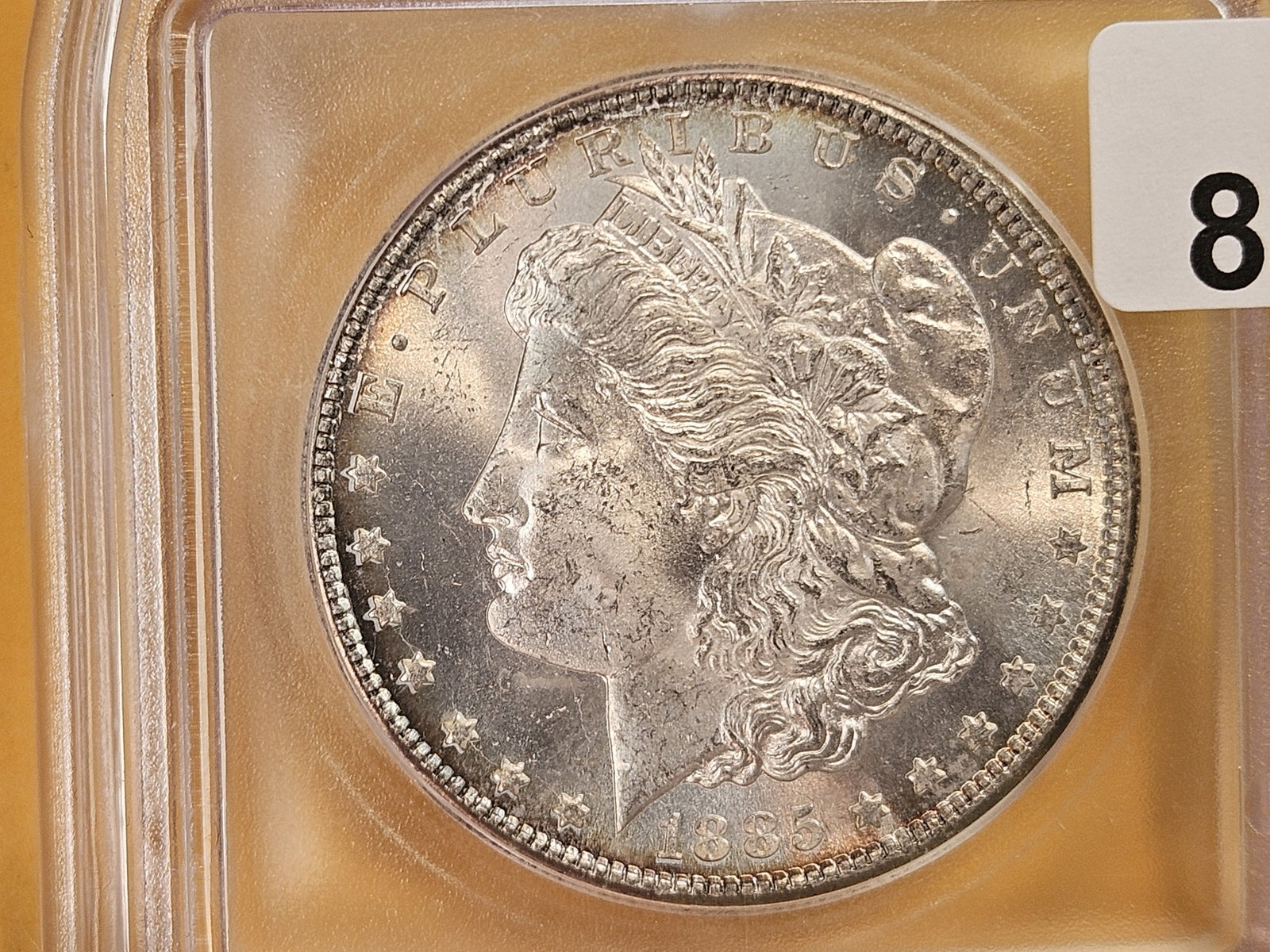 ** KEY DATE ** ICG 1885-CC Morgan Dollar in Mint State 64 - 8
