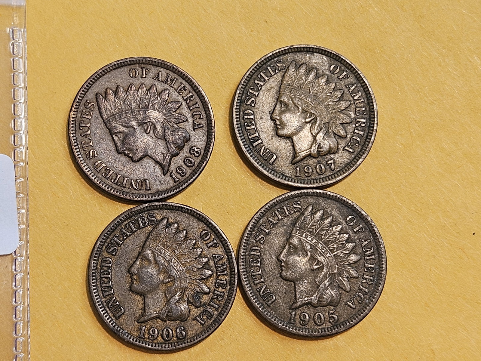 Four Indian Cents in Extra fine to About Uncirculated: 1905, 1906, 1907 and 1908