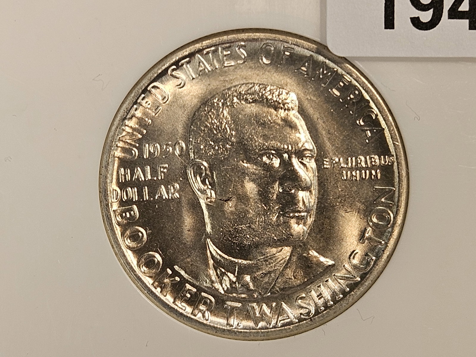 GEM Brilliant Uncirculated 1950 Commemorative Silver Half Dollar: Booker T Washington. In an off-brand holder. Gemmy looking coin!