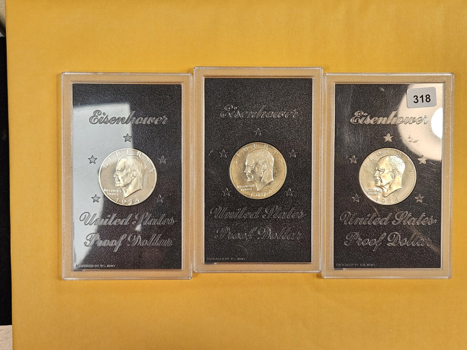 Three 1974-S Silver Eisenhower Dollars: Proof Brown Ikes in GSA hardpacks. No outer boxes