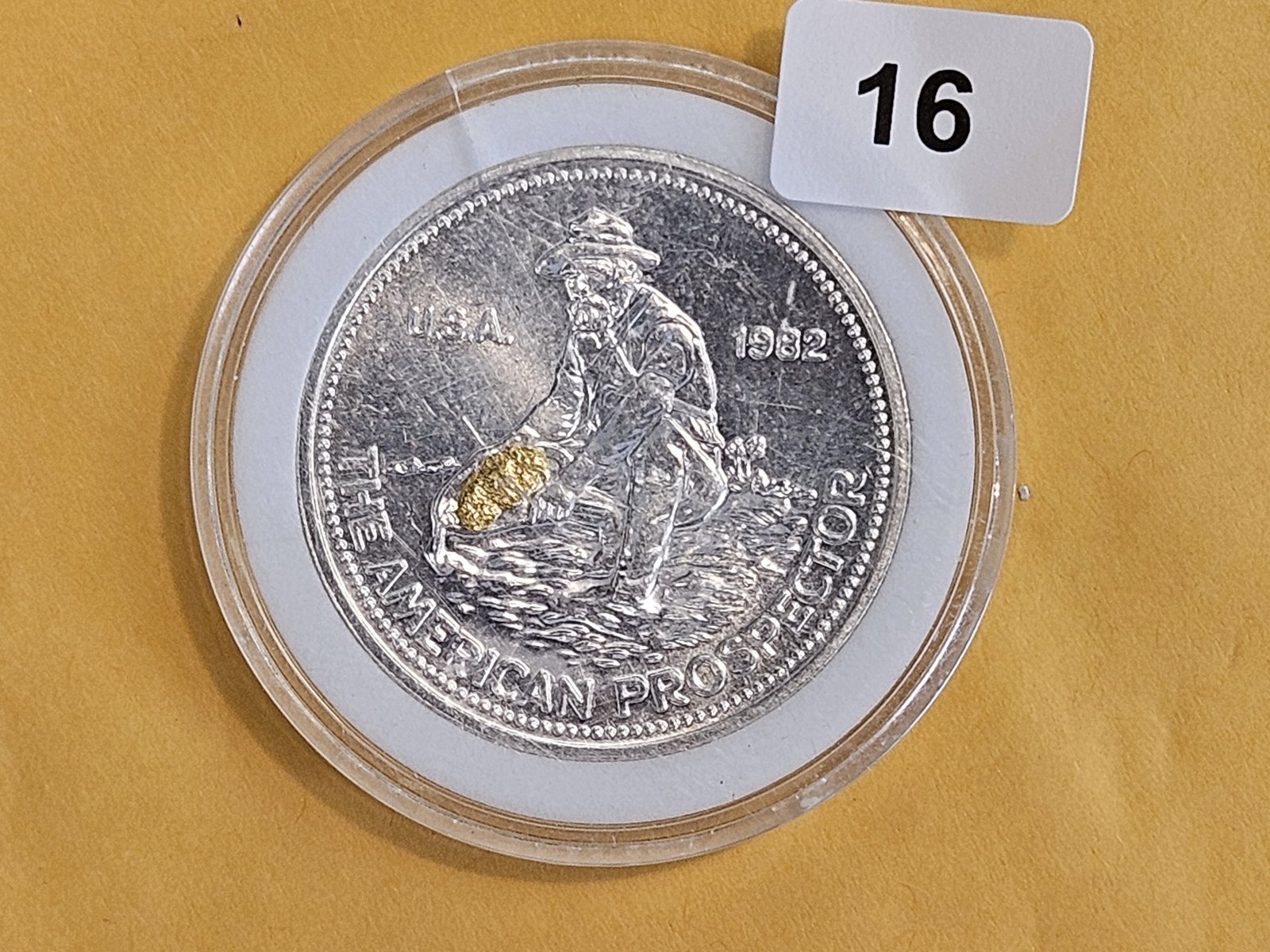 GOLD….and silver! Englehard Silver Round with GOLD Nuggets: One troy ounce .999 fine silver round with a Gold nugget embedded into the Prospector's pan