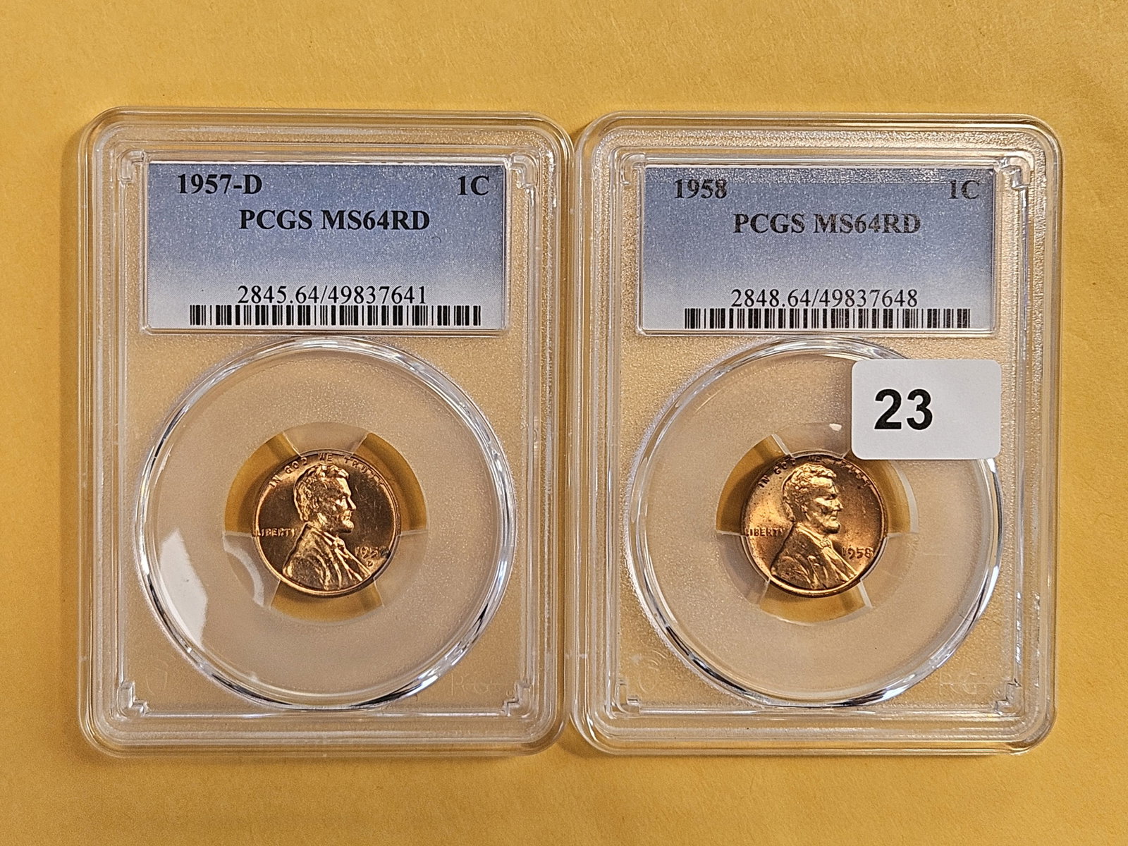 Two PCGS-graded Mint State 64 RED Wheat cents: 1957-D and 1958