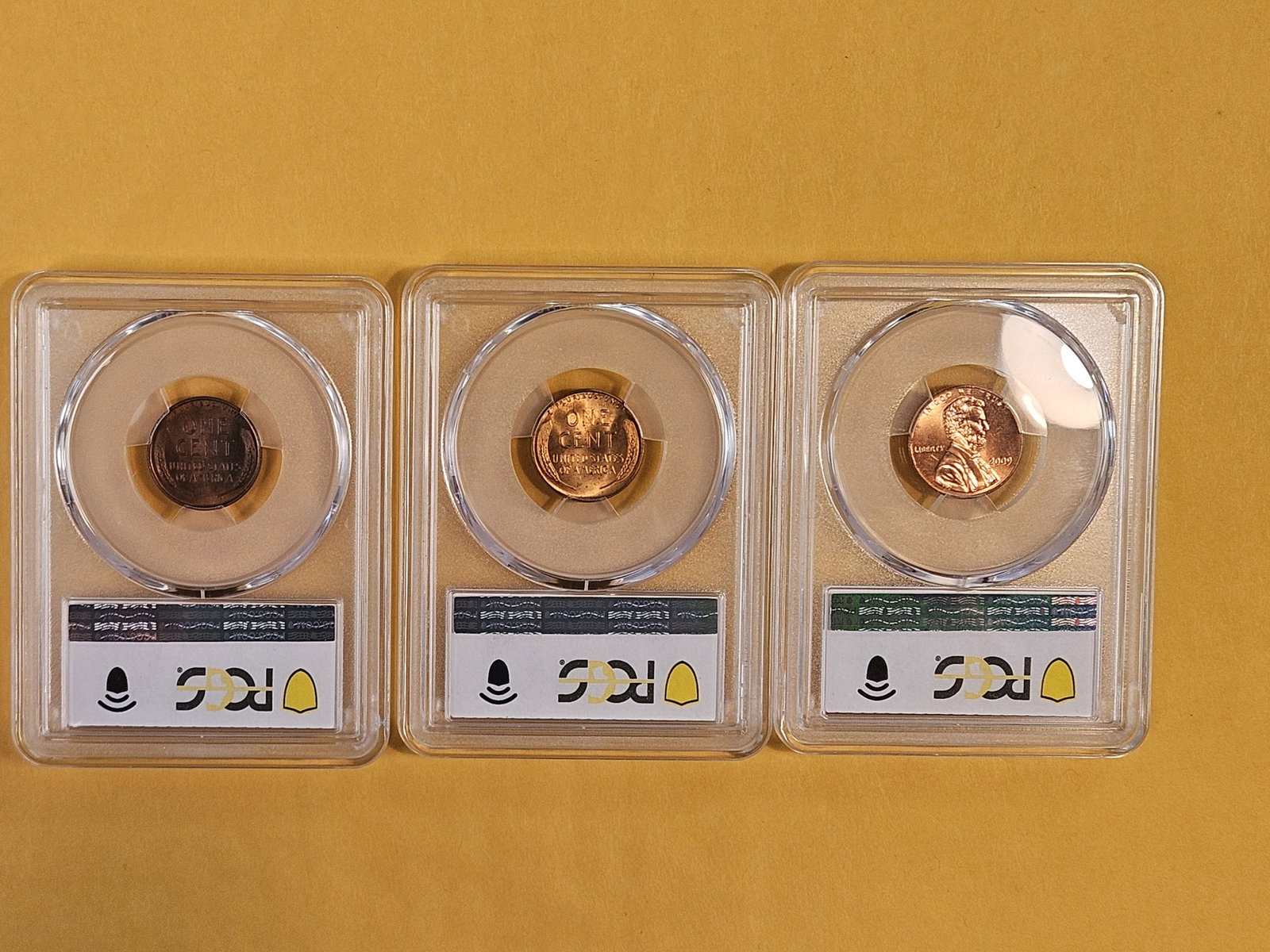 Three PCGS-graded Mint State 64 RED Lincoln cents - 2