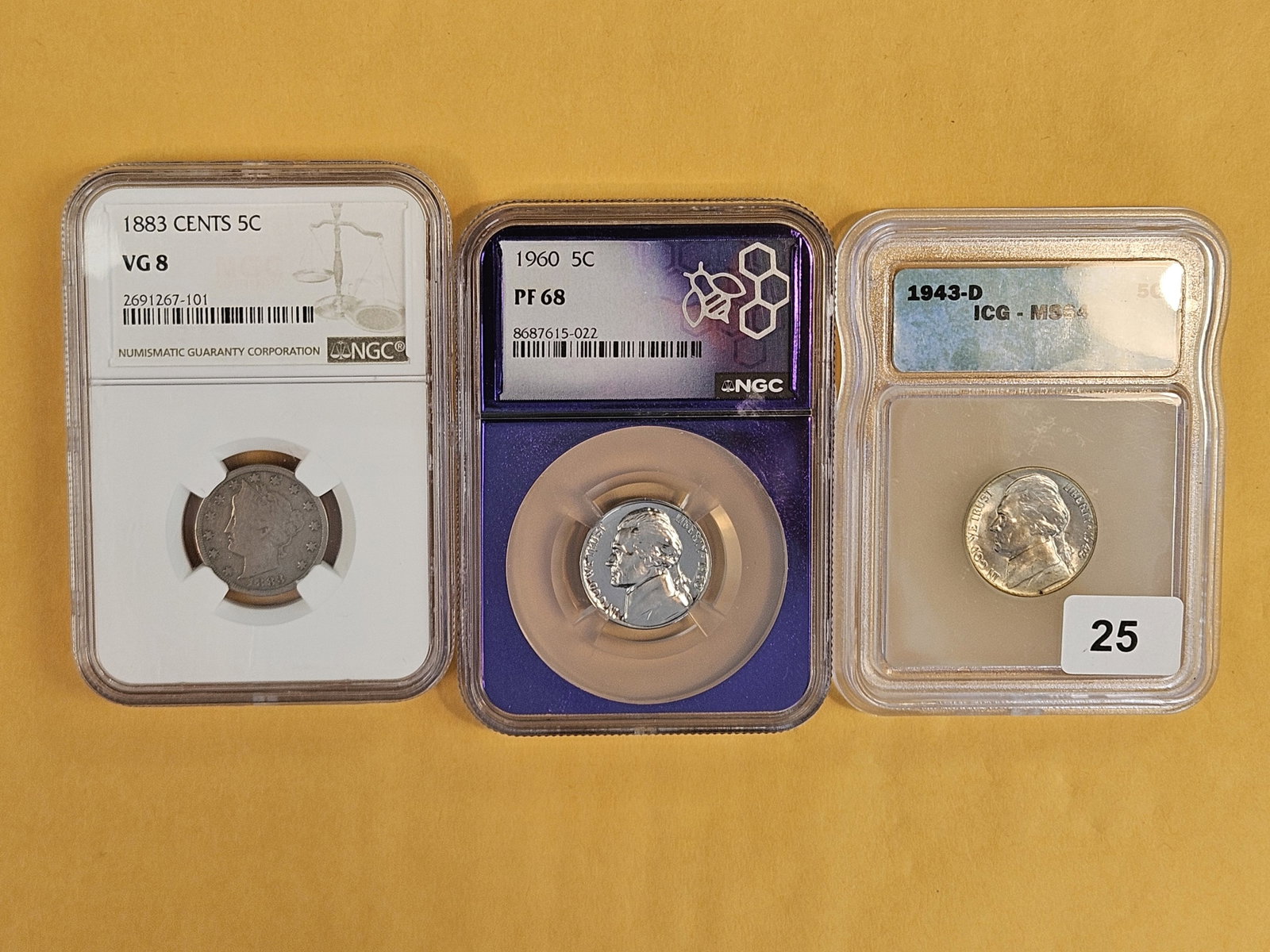 Three mixed NGC and ICG-Graded Nickels: 1883, 1960 and 1943-D silver