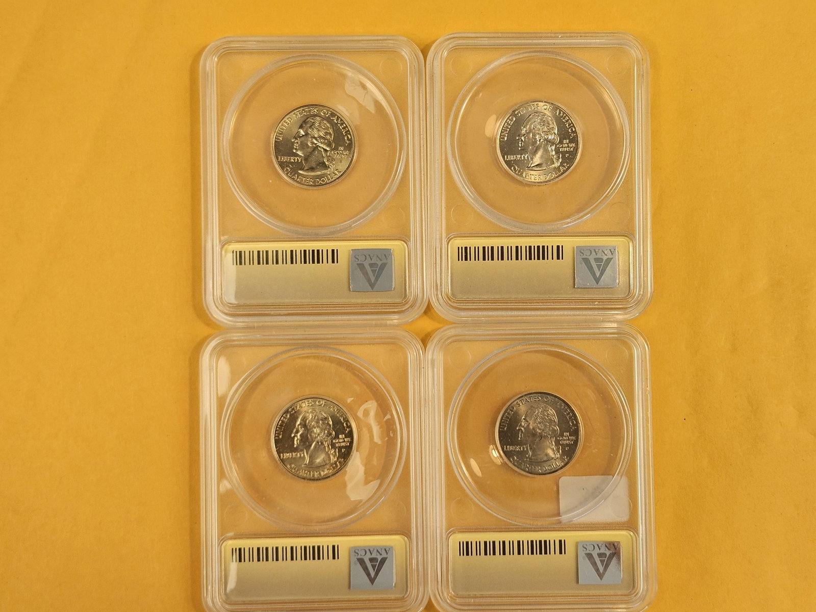 Four, Superb GEM, ANACS-graded Mint State 67 Washington Quarters - 2