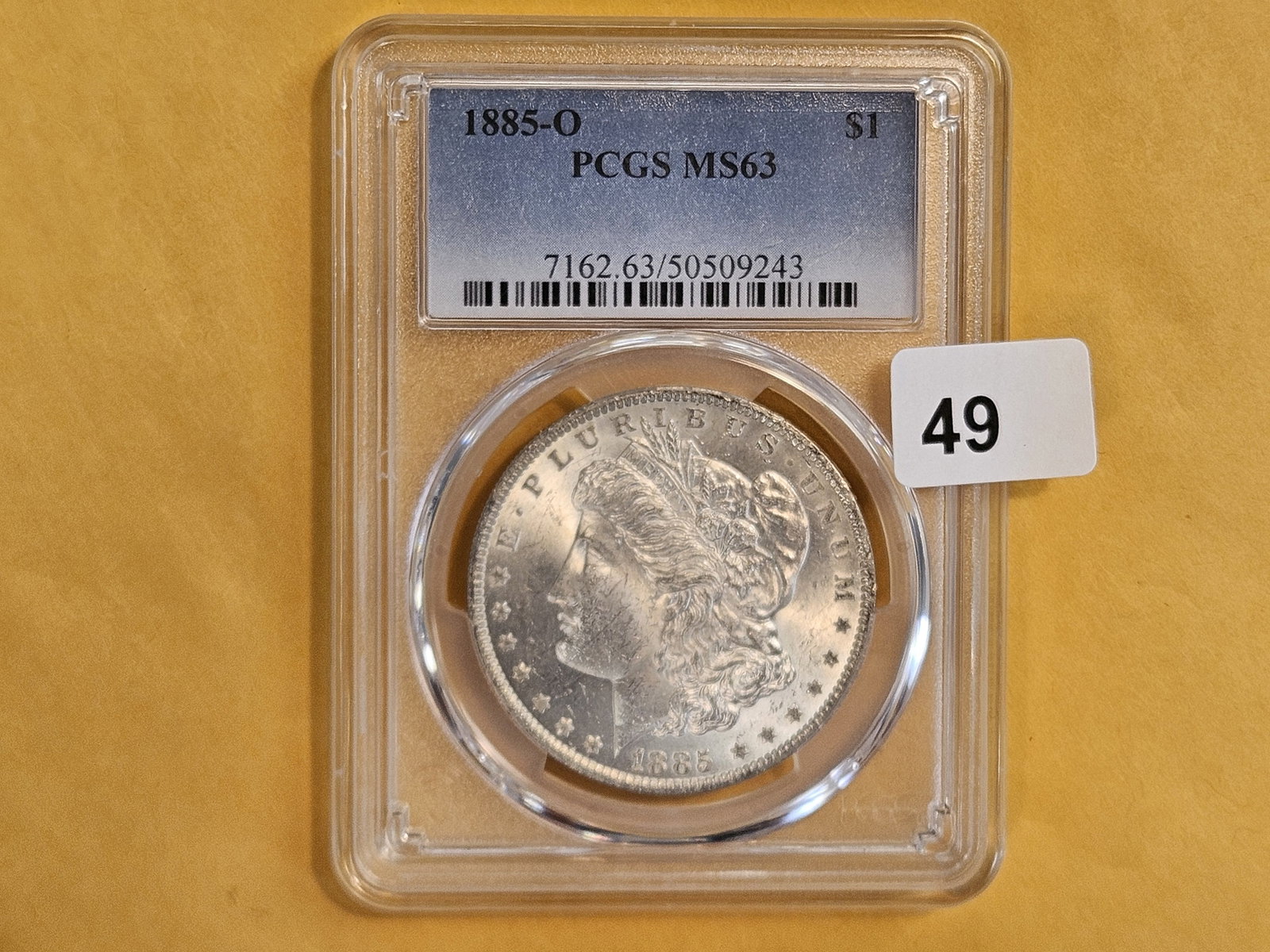 PCGS 1885-O Morgan Dollar in Mint State 63: Sharp