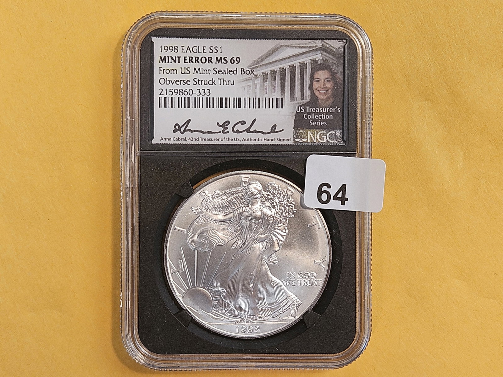 ** MINT ERROR ** NGC 1998 American silver Eagle in Mint State 69: Rare Struck-Through Error! Very rare on a modern coin and extremely rare on such a thoroughly precise product like an ASE!