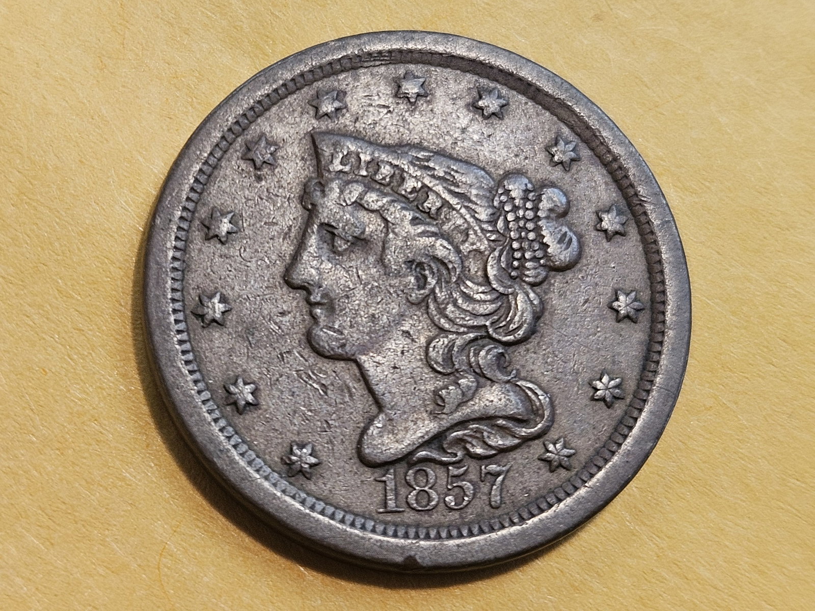 1857 Braided Hair Half-Cent in Very Fine plus: Last year issue