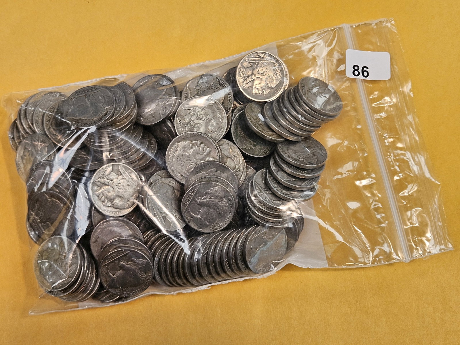 Almost TWO POUNDS of Buffalo Nickels: Mixed. From consignor. Unchecked by us…bout 4 ounces shy of 2 pounds