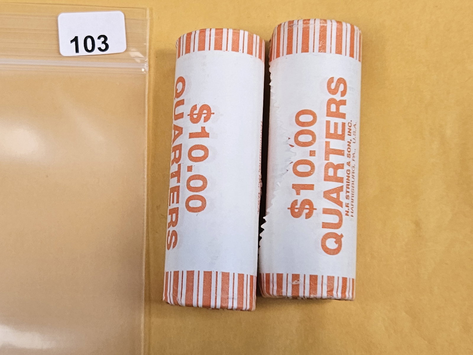Two GEM Brilliant Uncirculated MINT-Wrapped Quarter Rolls: Ends are toned. Unopened by us