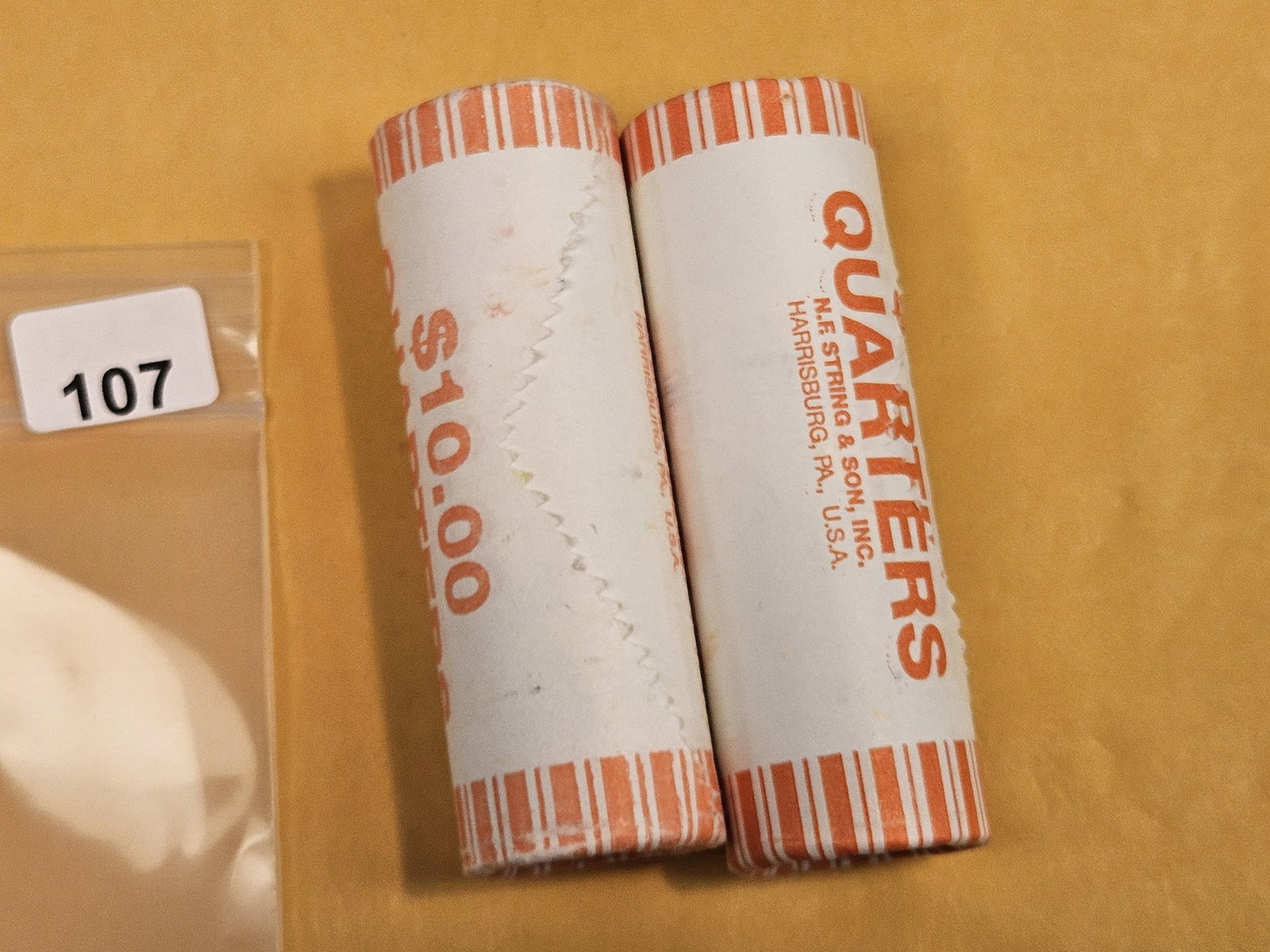 Two GEM Brilliant Uncirculated MINT-Wrapped Quarter Rolls: Ends are toned. Unopened by us