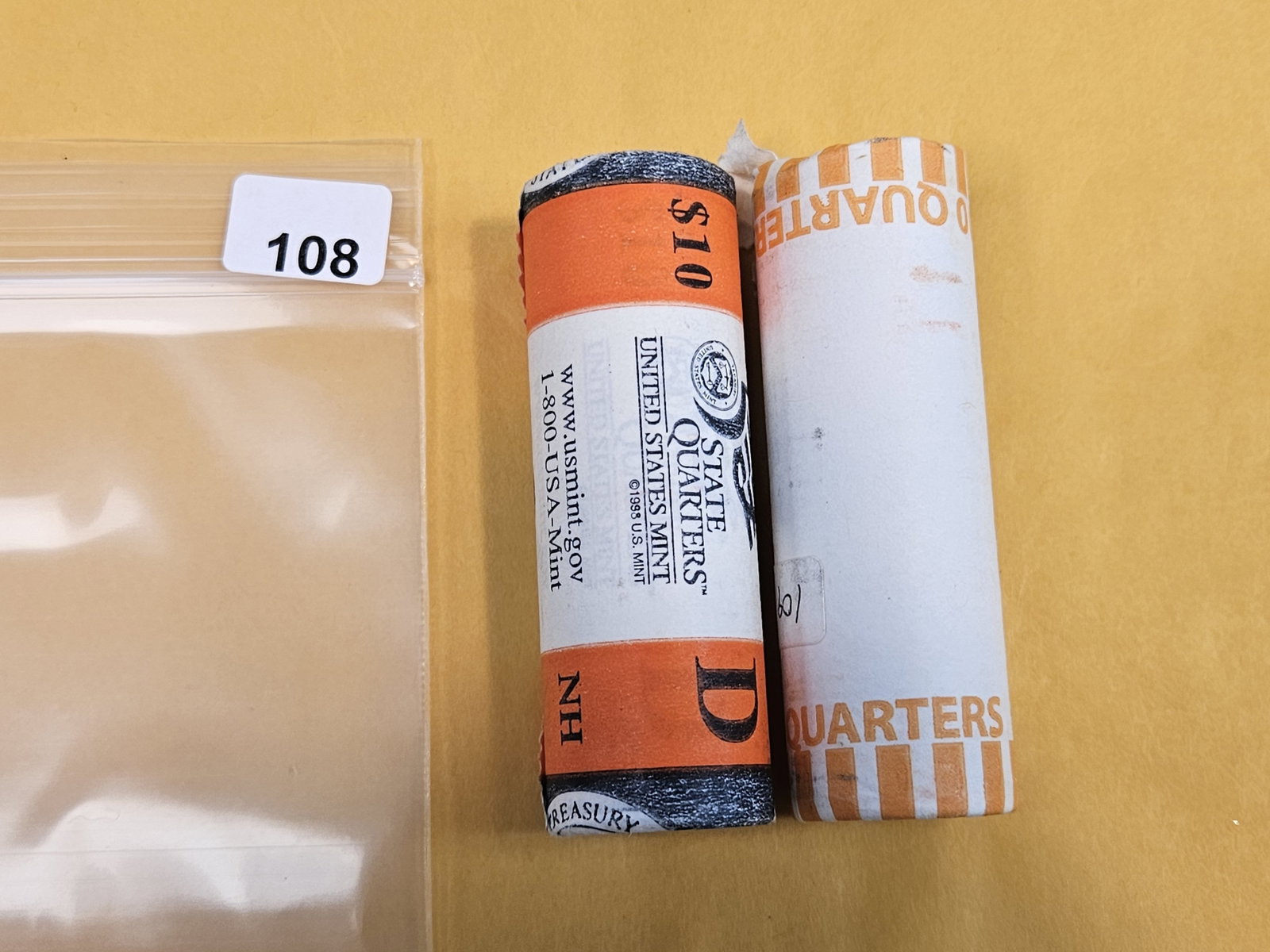 Two GEM Brilliant Uncirculated MINT-Wrapped Quarter Rolls: Ends are toned. Unopened by us