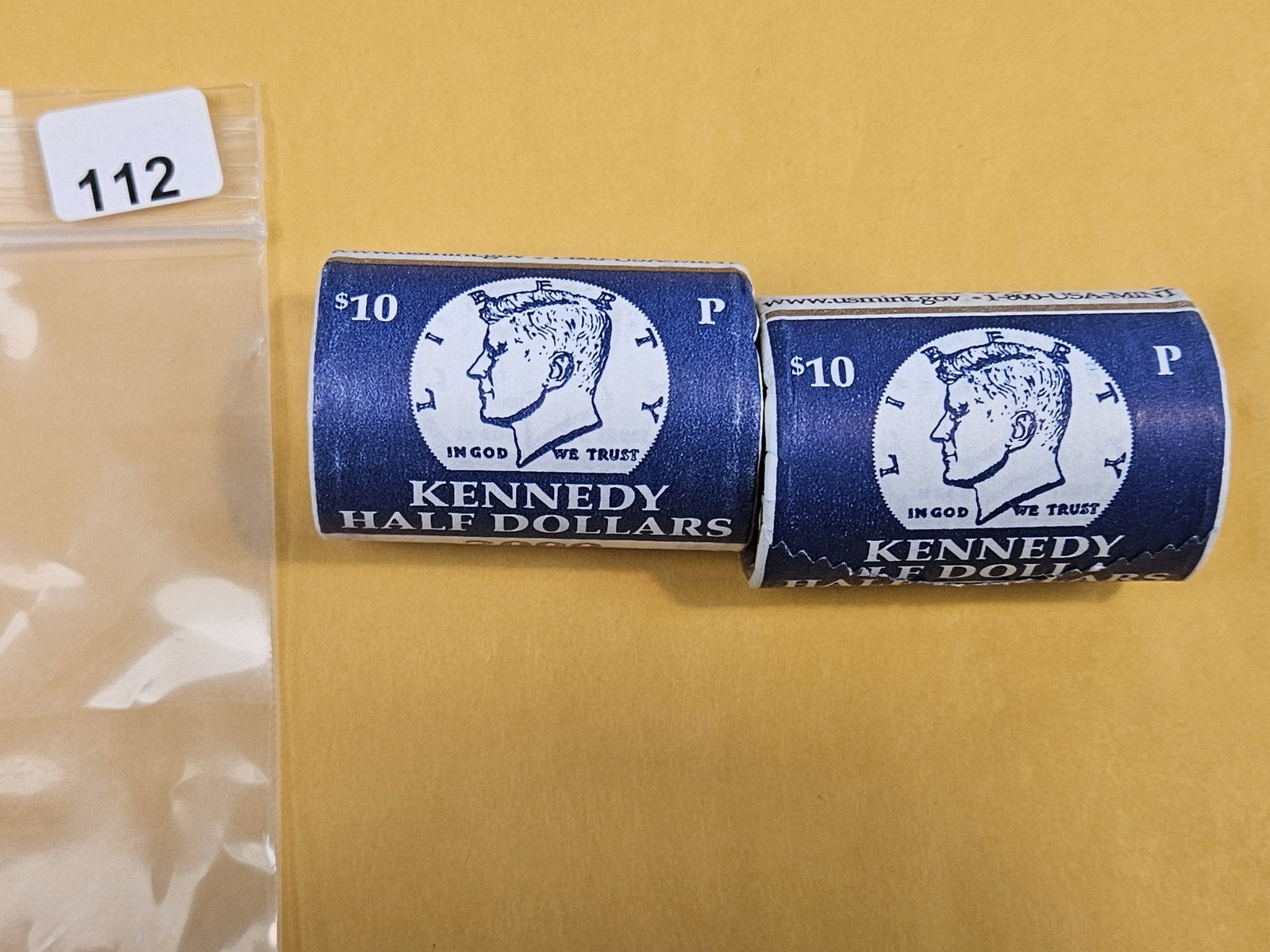 Two Mint-Wrapped, GEM Brilliant Uncirculated Kennedy Half Dollars: From consignor. Unopened by us