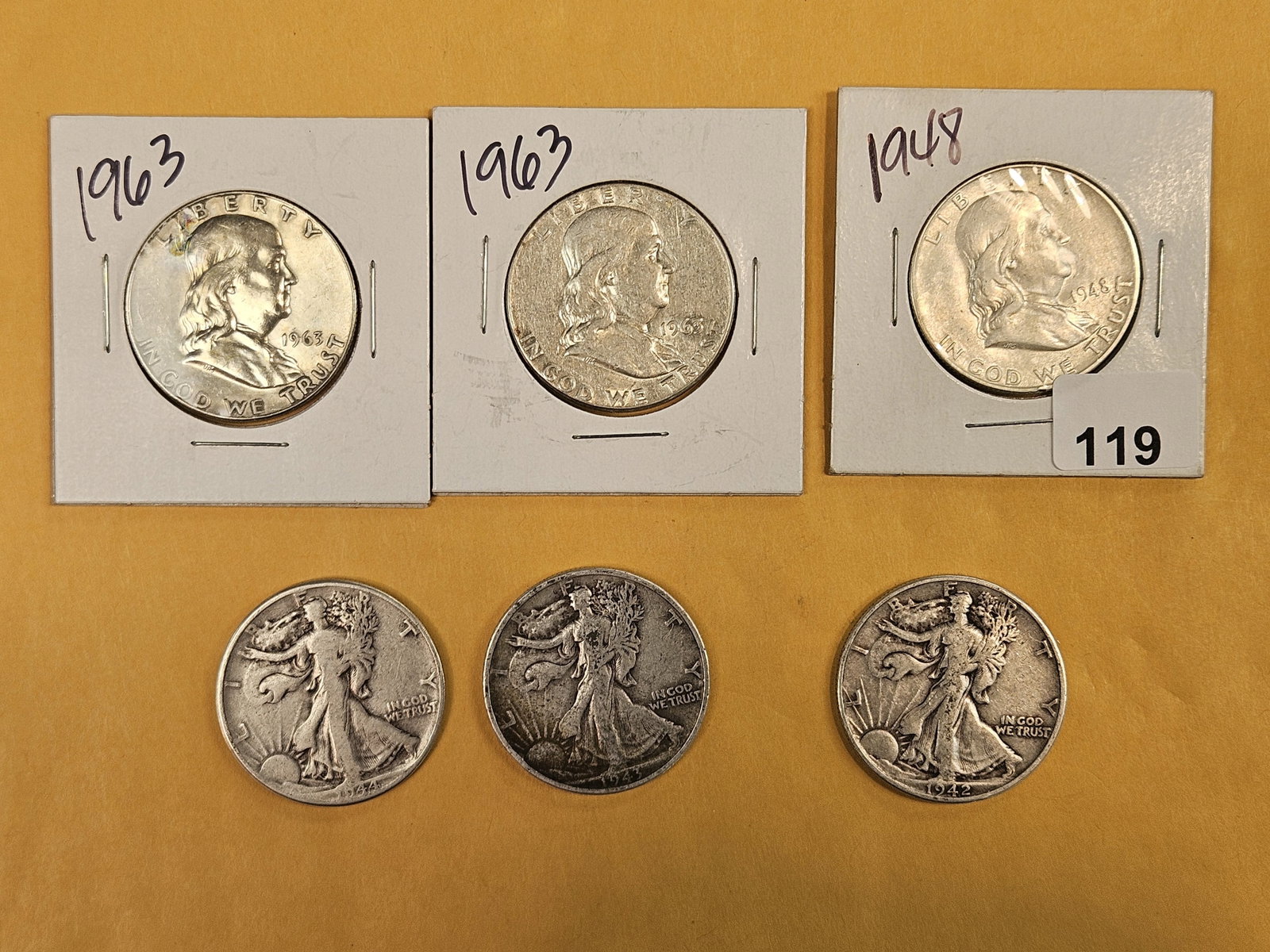 Six mixed Silver Half Dollars: Franklins and Walkers