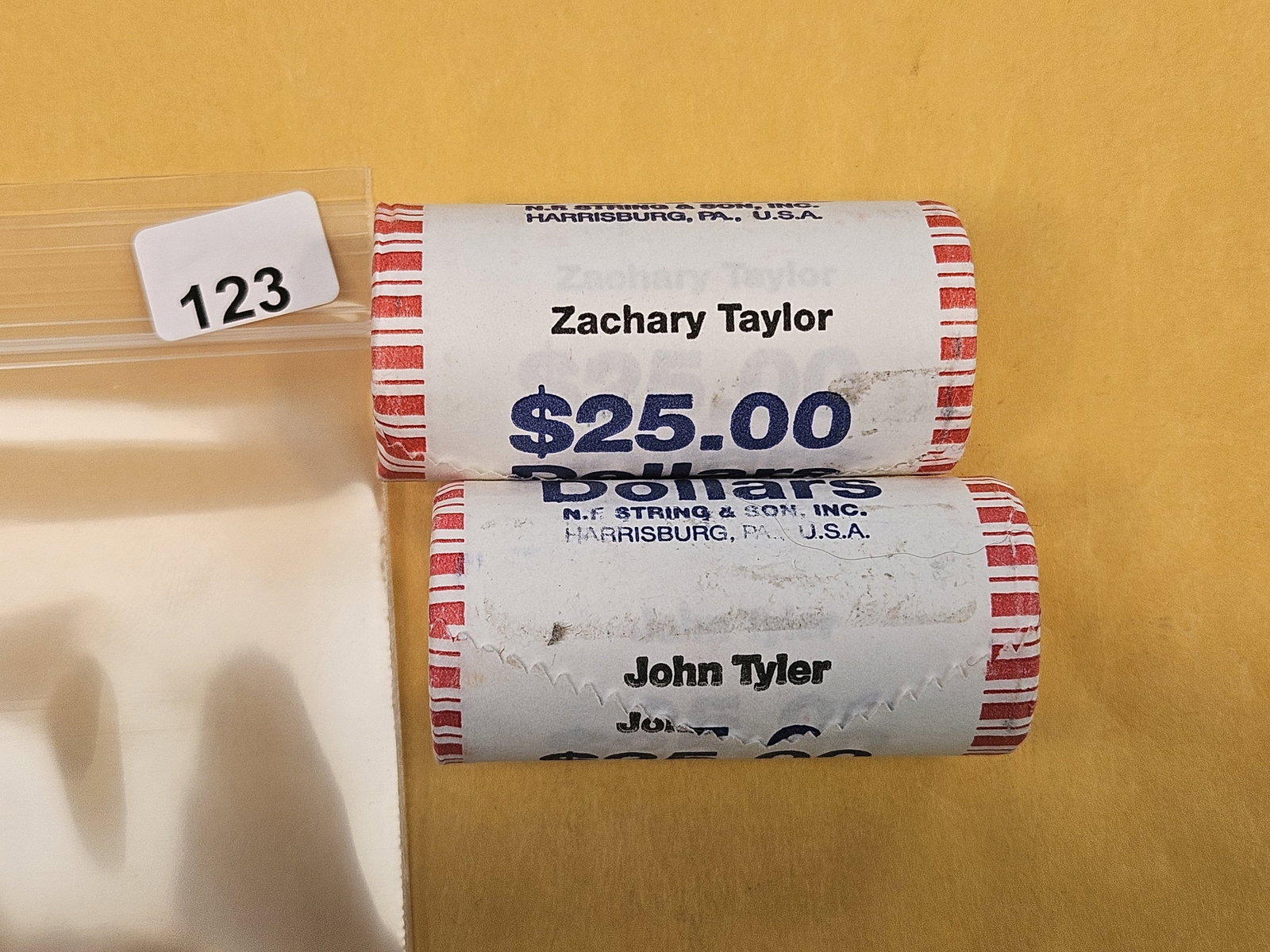 Two Mint-Wrapped, GEM Brilliant Uncirculated Presidential Dollar Rolls: Taylor and Tyler