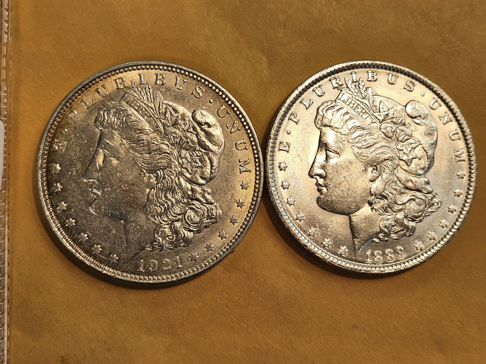 Two Brilliant About Uncirculated plus Morgan Dollars: Mixed