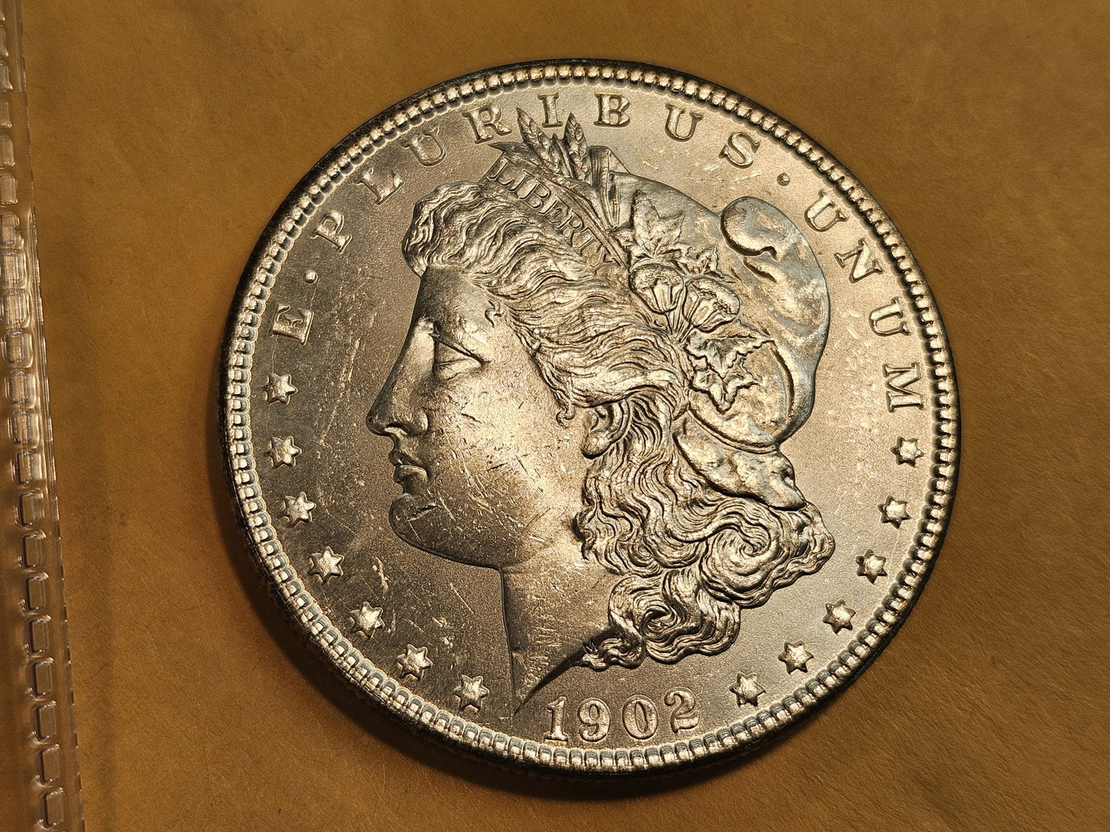 Choice Brilliant Uncirculated plus 1902-O Morgan Dollar: Blast white!