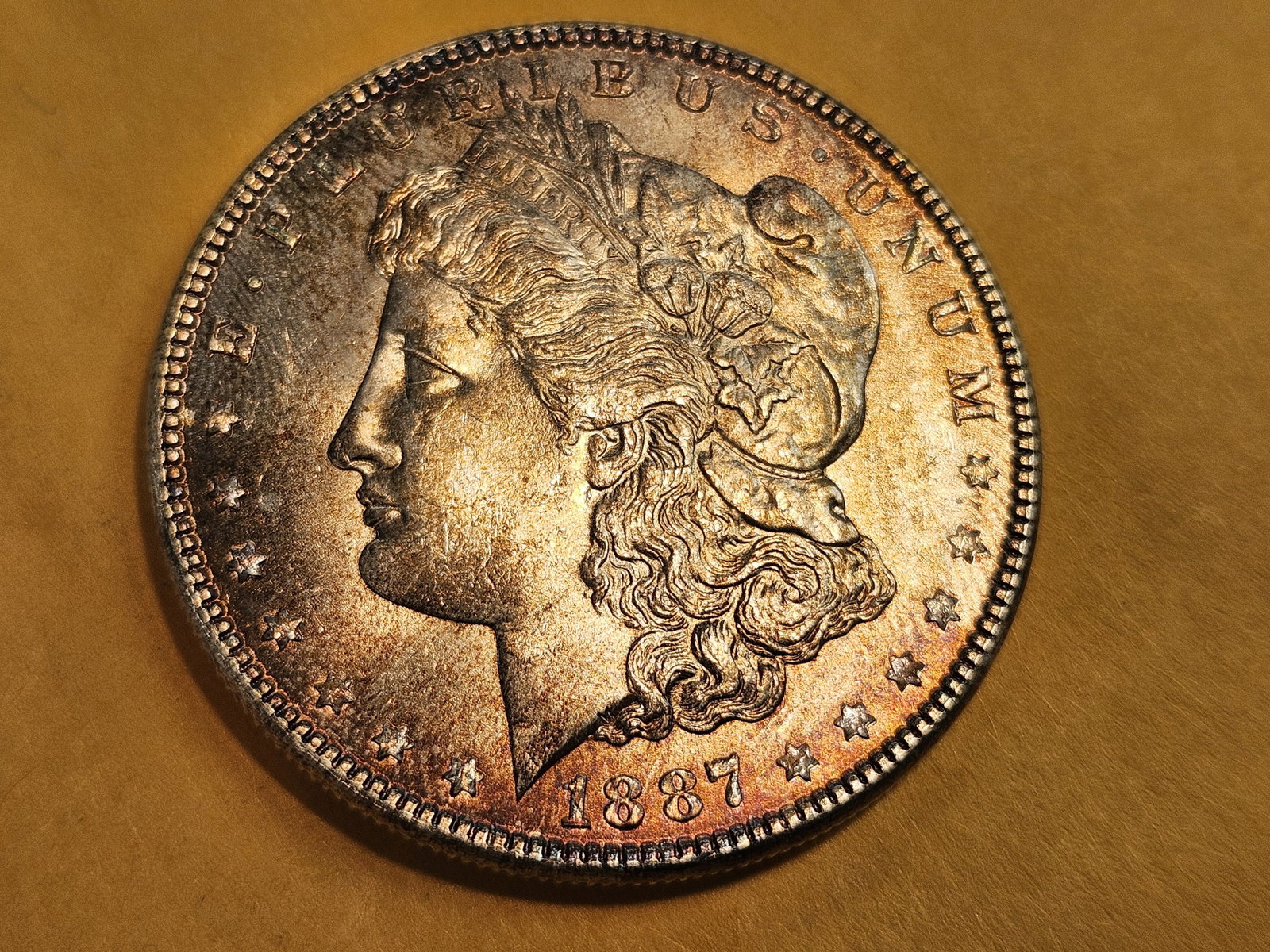 Very Choice to GEM Brilliant Uncirculated 1887 Morgan Dollar: Lovely obverse toning!