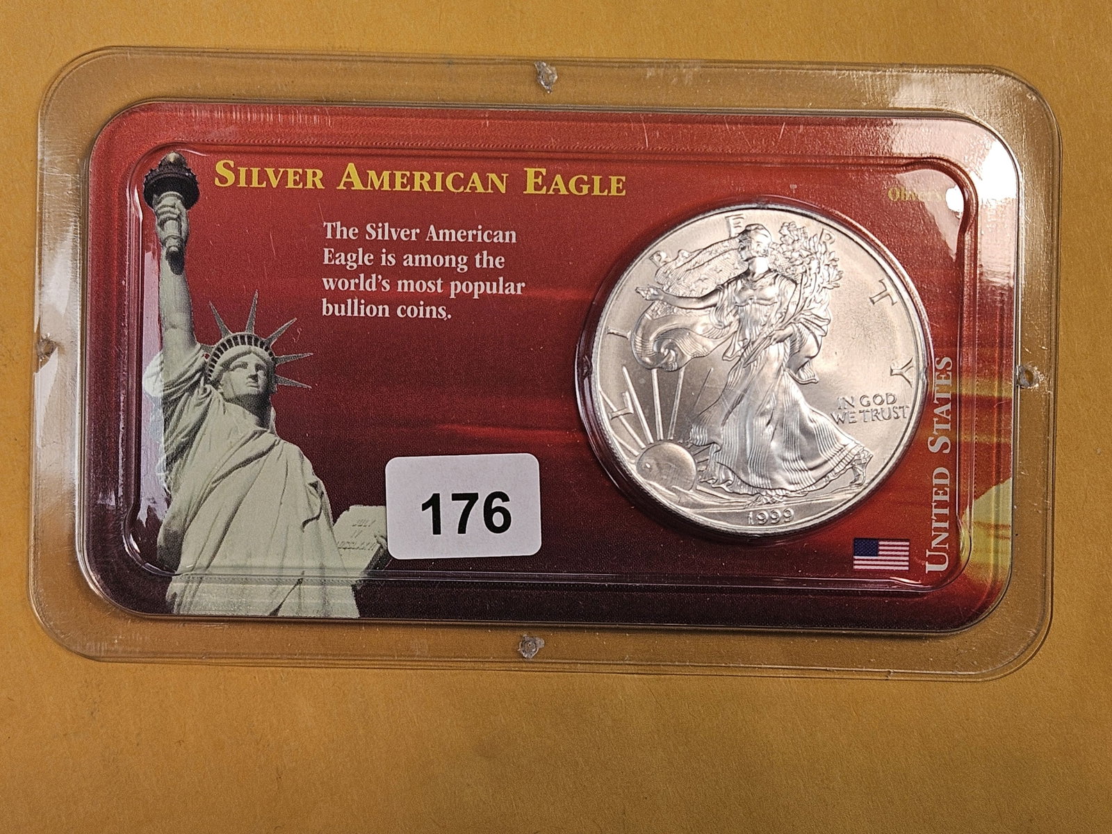 GEM Brilliant Uncirculated 1999 American Silver Eagle: In Littleton plastic holder.