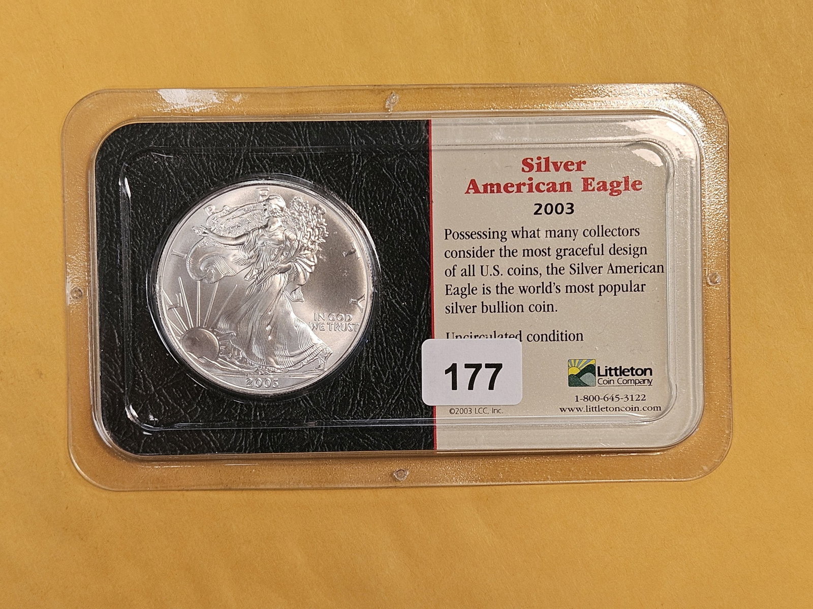 GEM Brilliant Uncirculated 2003 American Silver Eagle: In Littleton plastic holder.
