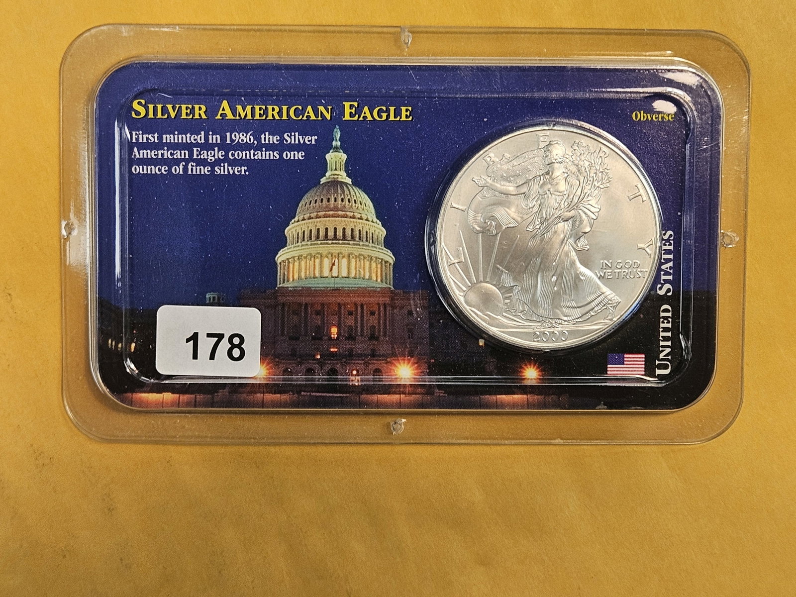 GEM Brilliant Uncirculated 2000 American Silver Eagle: In Littleton plastic holder.