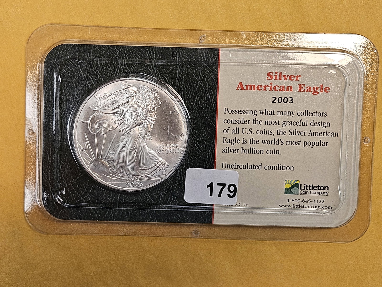 GEM Brilliant Uncirculated 2003 American Silver Eagle: In Littleton plastic holder.