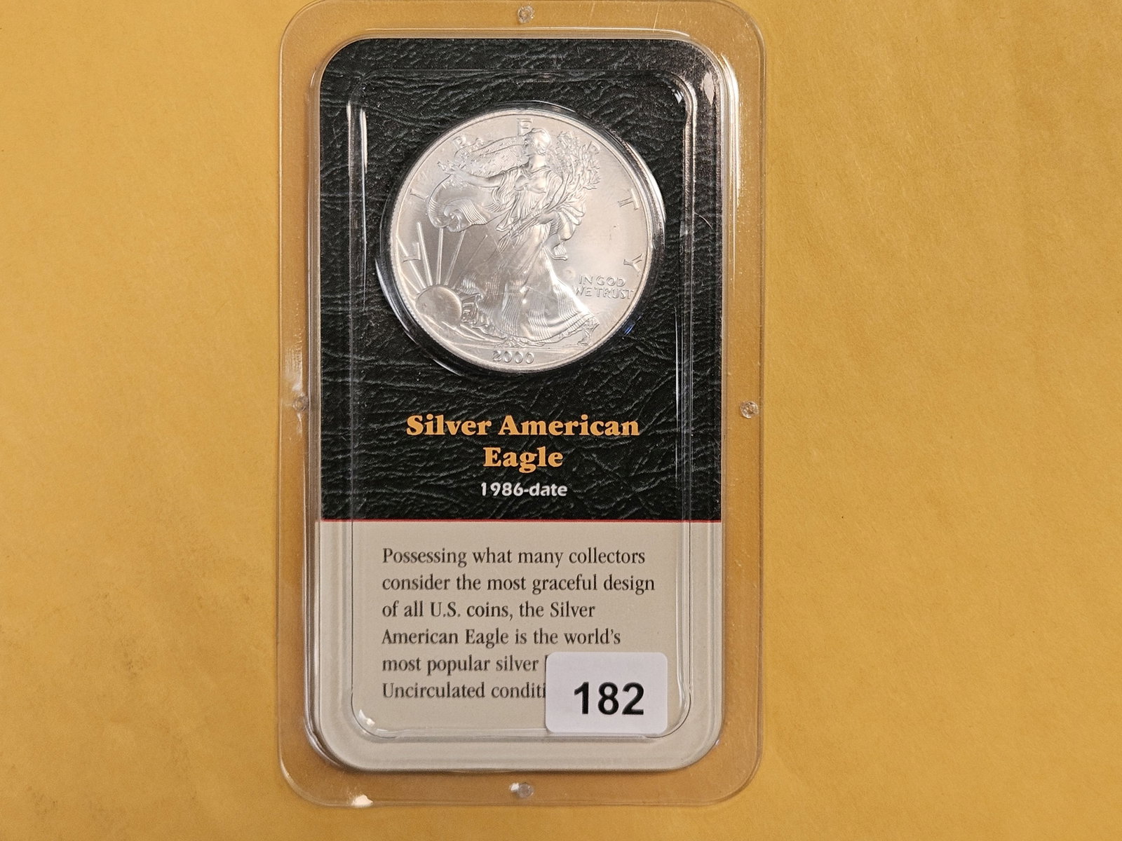 GEM Brilliant Uncirculated 2000 American Silver Eagle: In Littleton plastic holder.