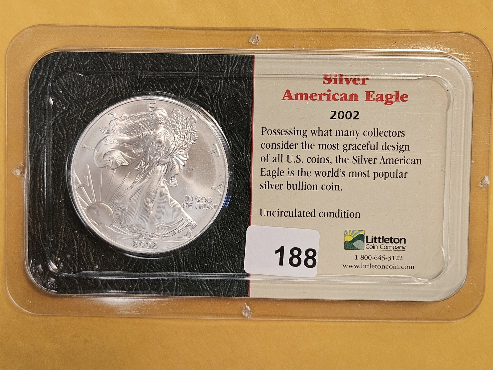 GEM Brilliant Uncirculated 2002 American Silver Eagle: In Littleton plastic holder.