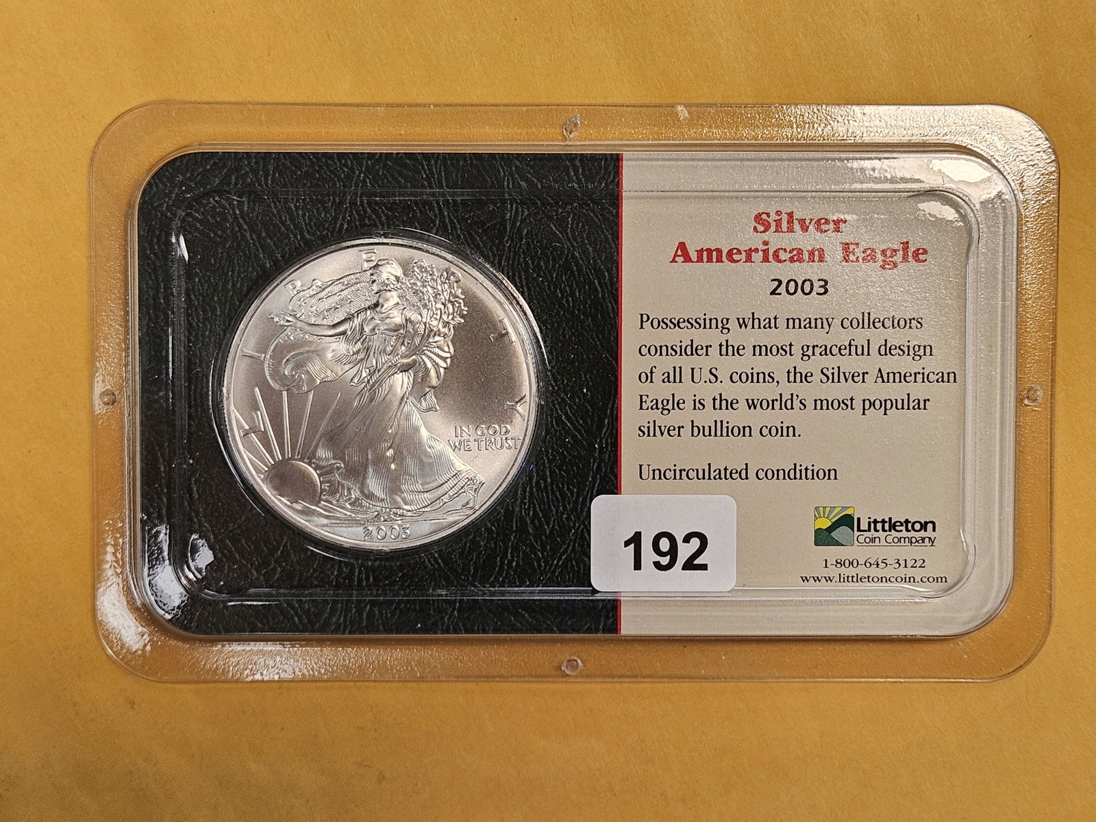 GEM Brilliant Uncirculated 2003 American Silver Eagle: In Littleton plastic holder.