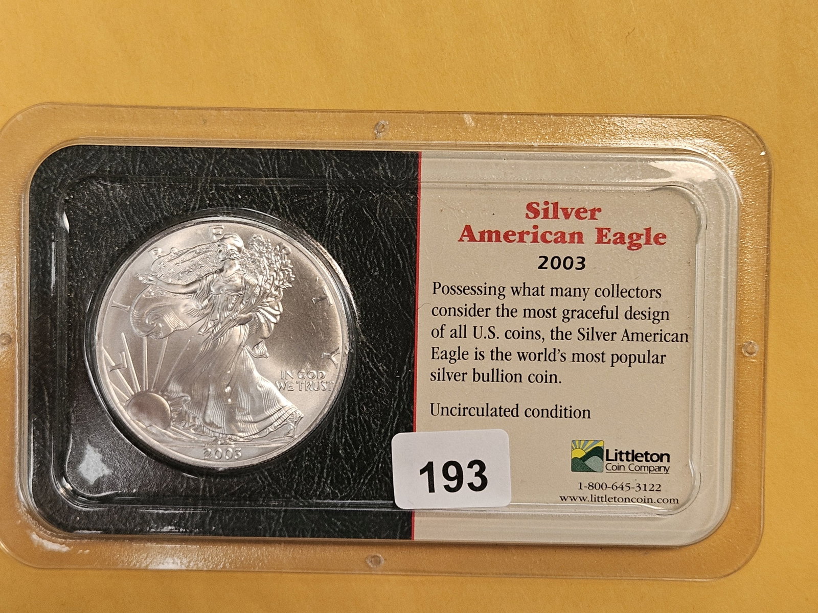 GEM Brilliant Uncirculated 2003 American Silver Eagle: In Littleton plastic holder.