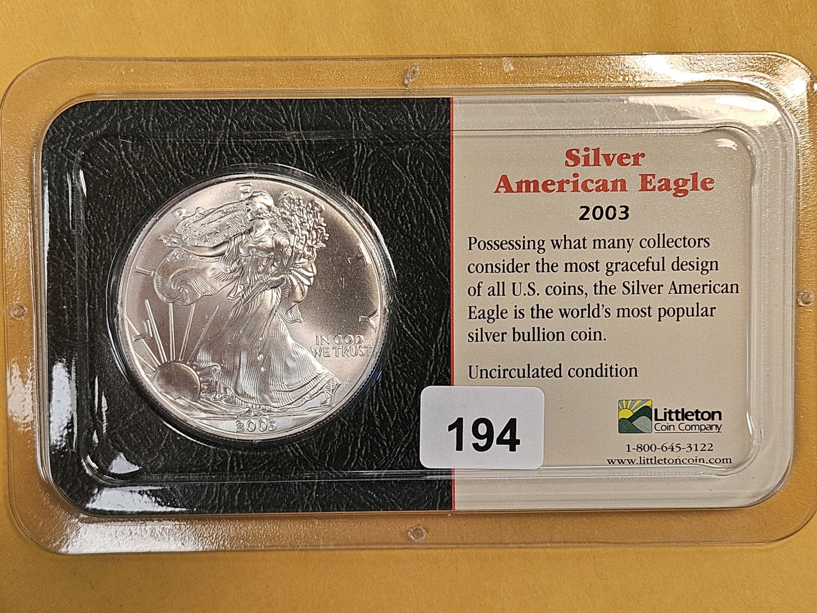 GEM Brilliant Uncirculated 2003 American Silver Eagle: In Littleton plastic holder.