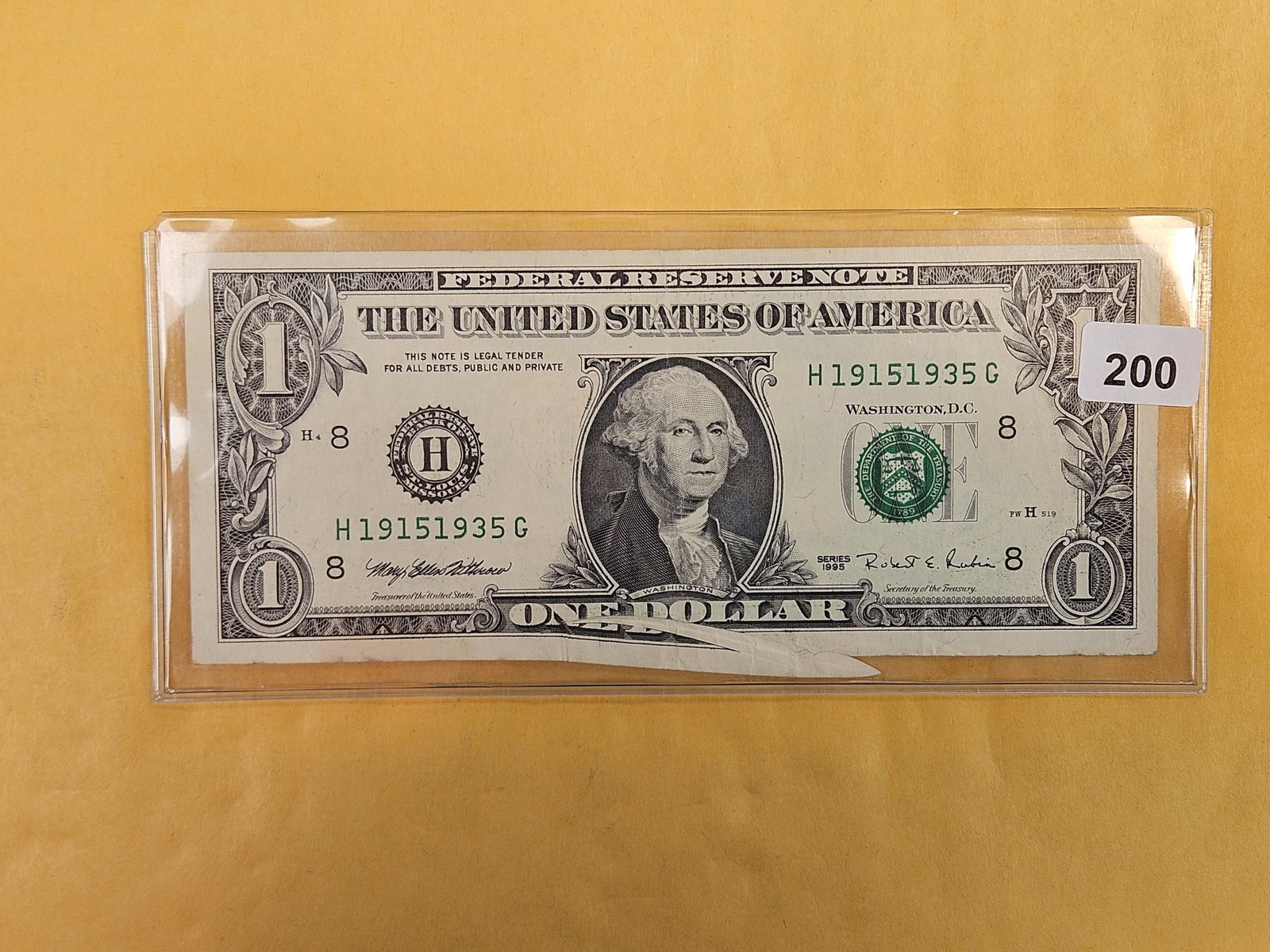 BEP ERROR! Series 1995 One Dollar FRN: Not sure what the term is for this one, but there is extra paper at the bottom of the note