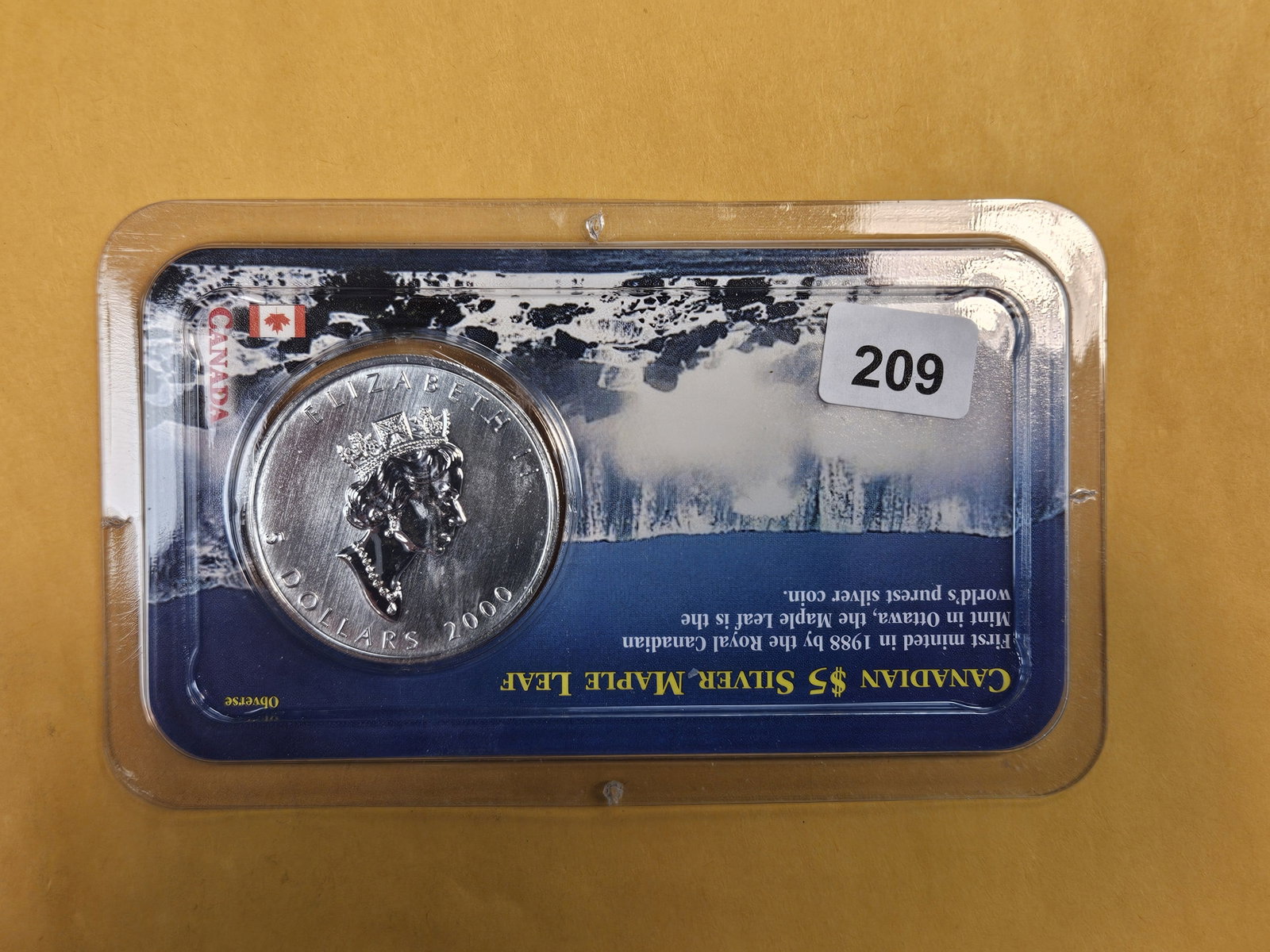 GEM 2000 Canada Silver Five Dollar Maple Leaf: In Littleton plastic holder.